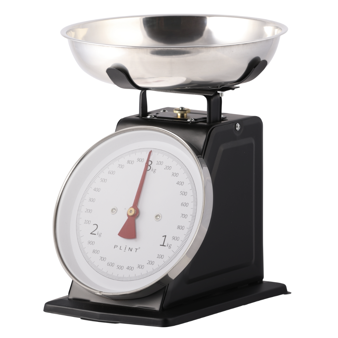 A stainless steel kitchen scale with a dishwasher-safe bowl, measuring 3 kg capacity, designed for precise ingredient measurements.