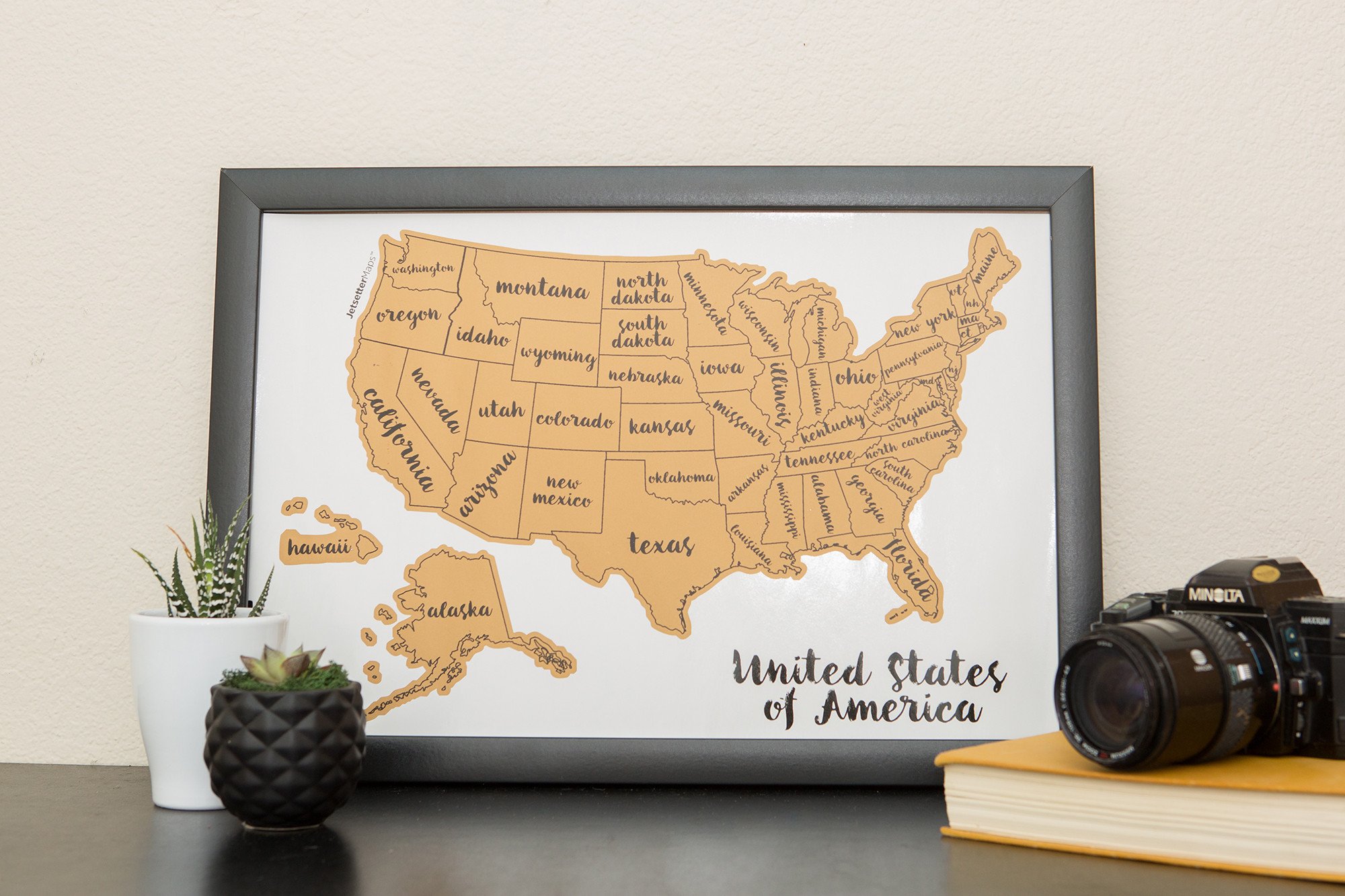 Scratch Your Travels® USA Map featuring vibrant watercolor states, perfect for tracking travels.