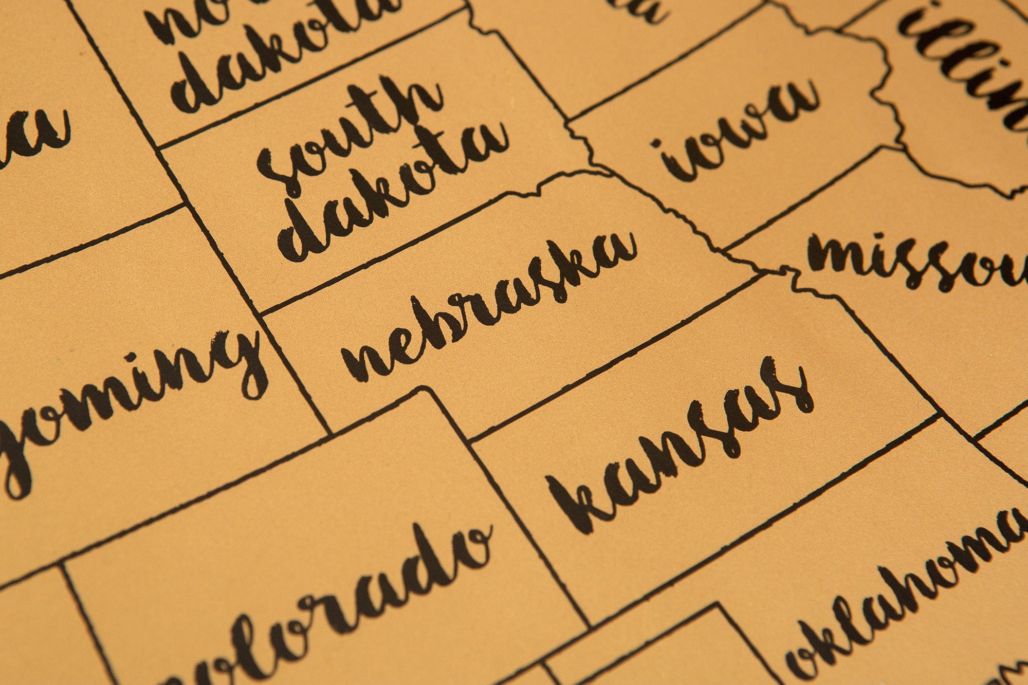 Scratch Your Travels® USA Map featuring vibrant watercolor states, perfect for tracking travels.