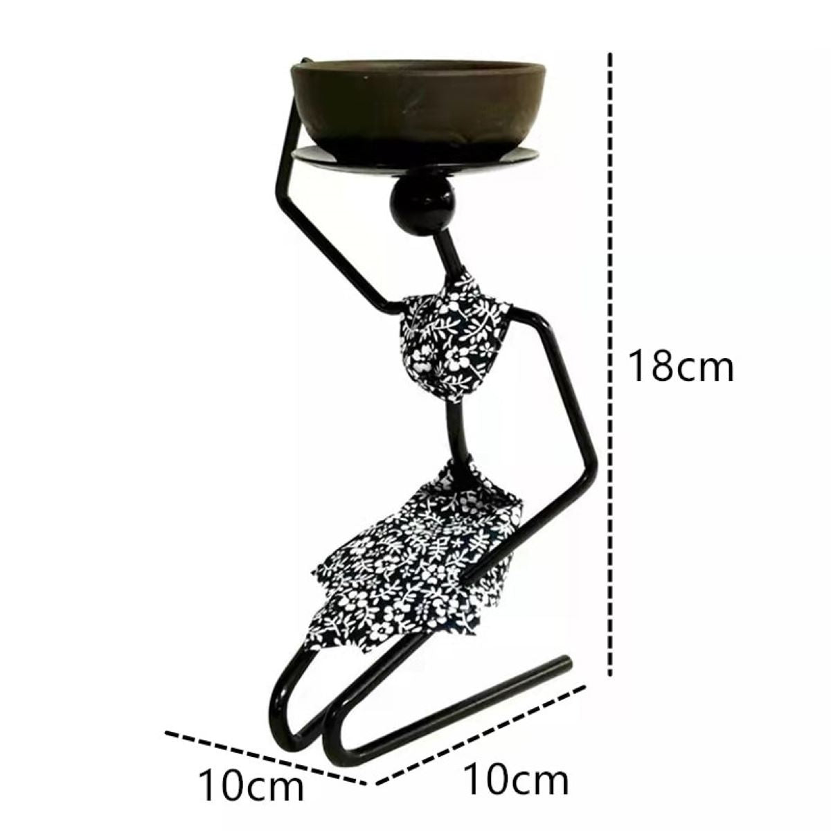 A stylish seated woman stick candle holder made of wrought iron, perfect for table decor.