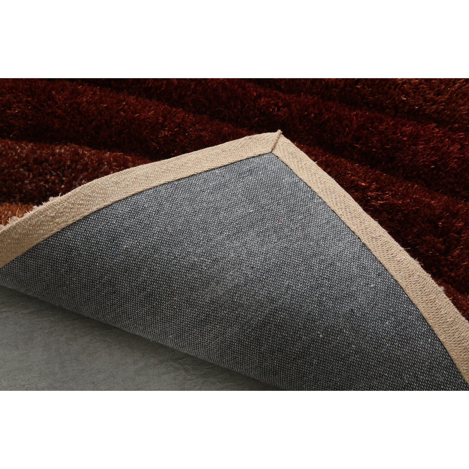 Sedona 3D Brown Shag Rug showcasing plush texture and modern wave design in brown and beige colors.