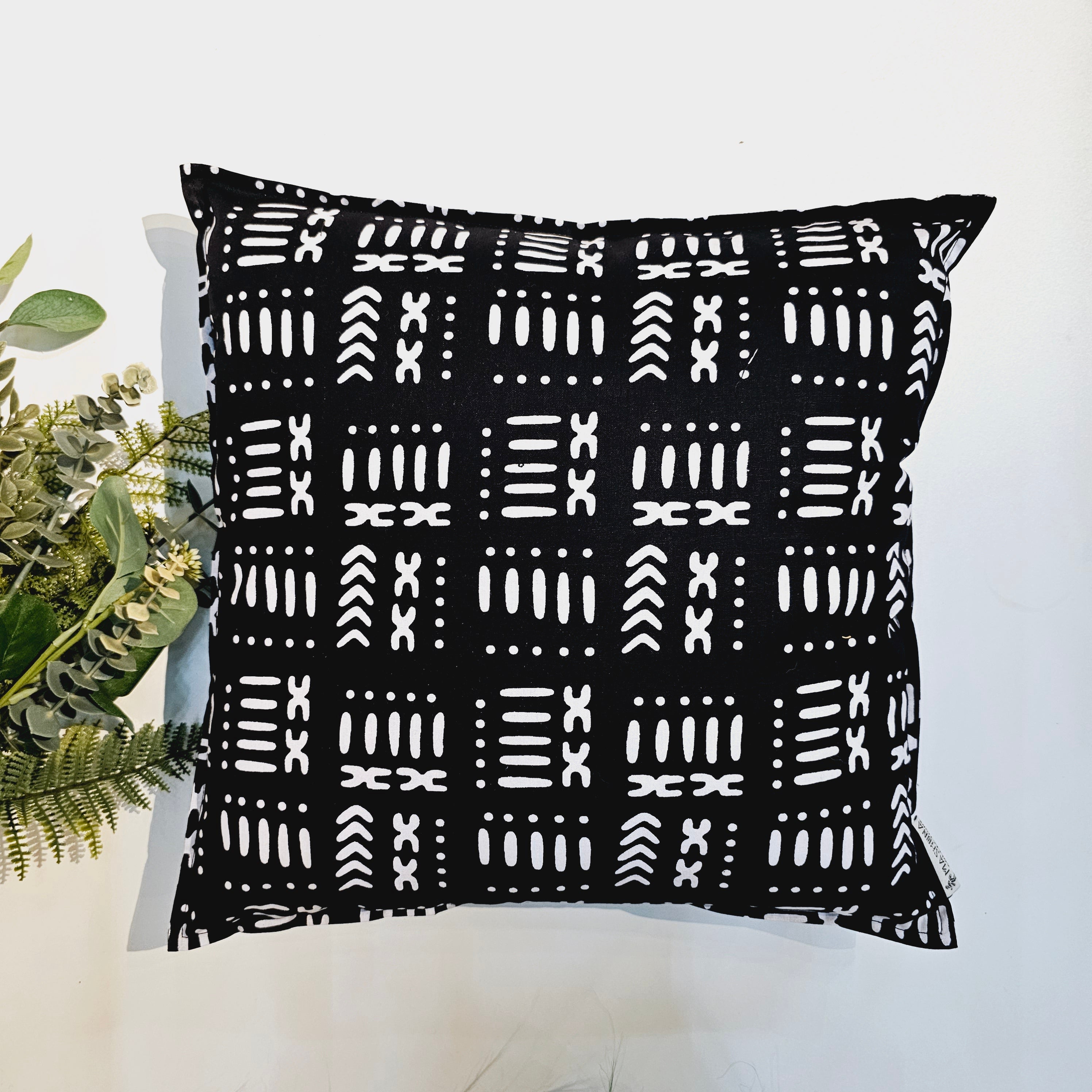 Set of 2 or 4 vibrant African print mudcloth cushion covers, showcasing unique patterns and colors, perfect for home decor.