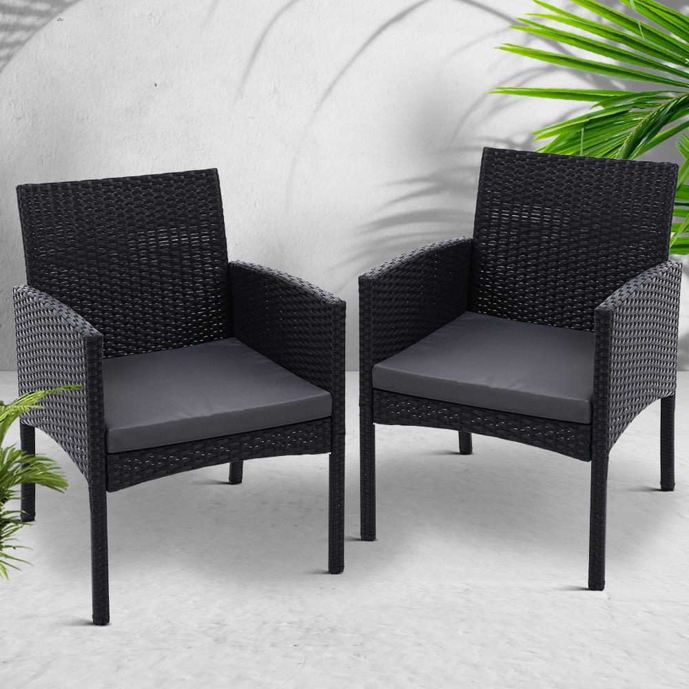 Set of 2 outdoor bistro chairs made of UV-resistant PE wicker with grey cushions, perfect for patio or deck use.