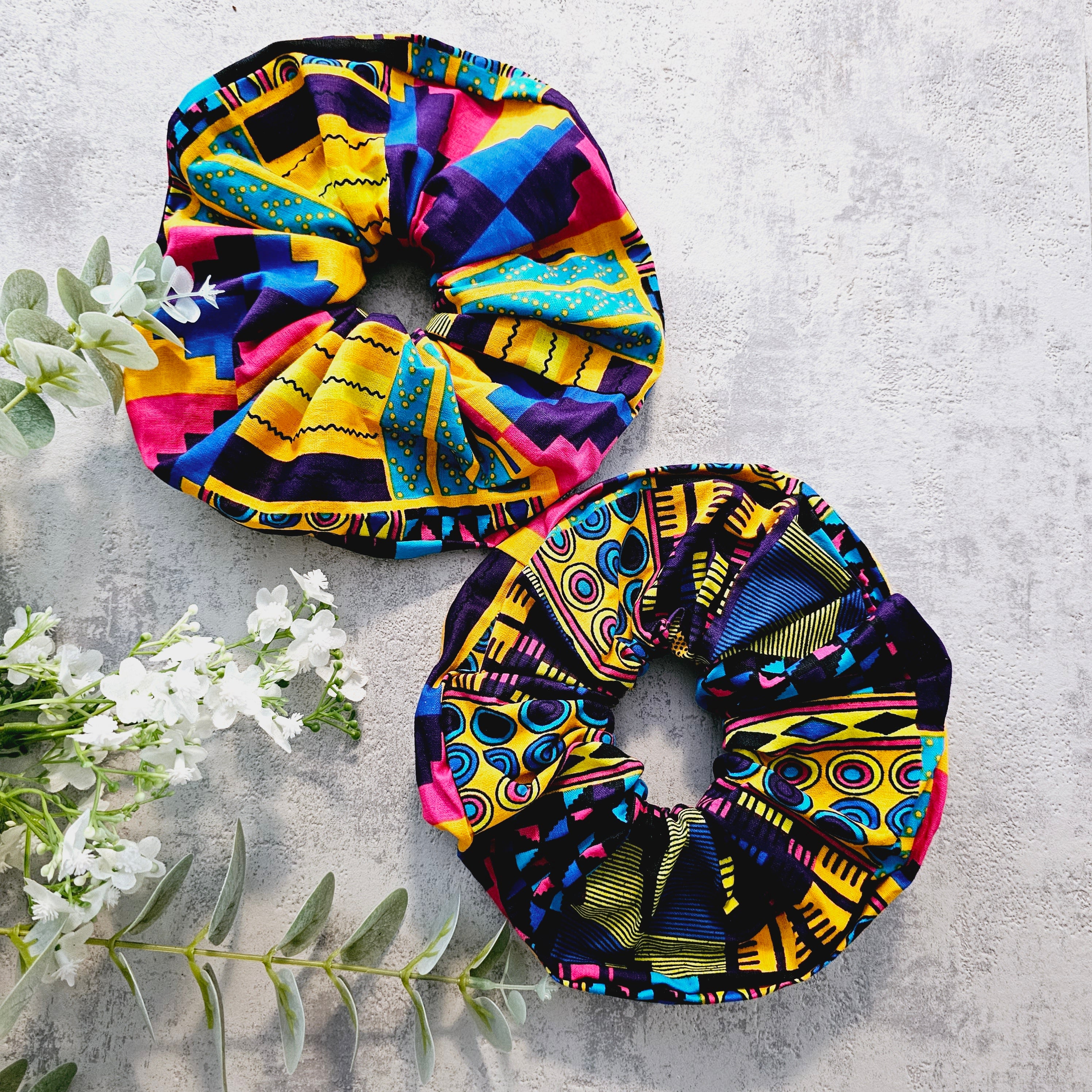 Set of 2 XL Hair Scrunchies in vibrant colors, showcasing their durable fabric and double-elastic design.