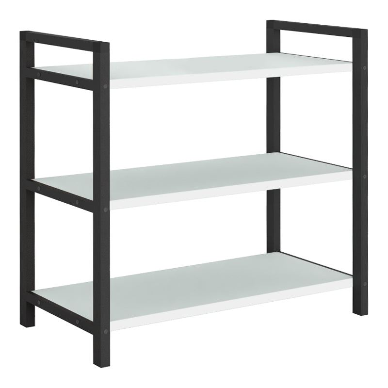 Shoe Rack UTILE in black and white, holding 9 pairs of shoes, featuring three shelves and a modern design.