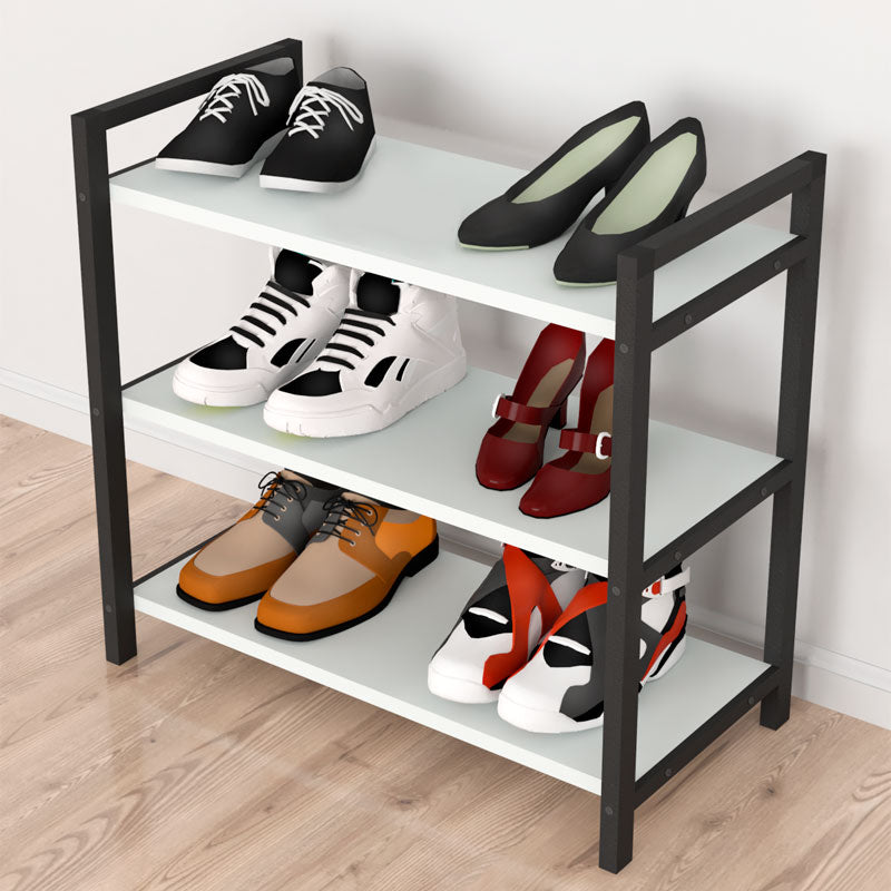 Shoe Rack UTILE in black and white, holding 9 pairs of shoes, featuring three shelves and a modern design.