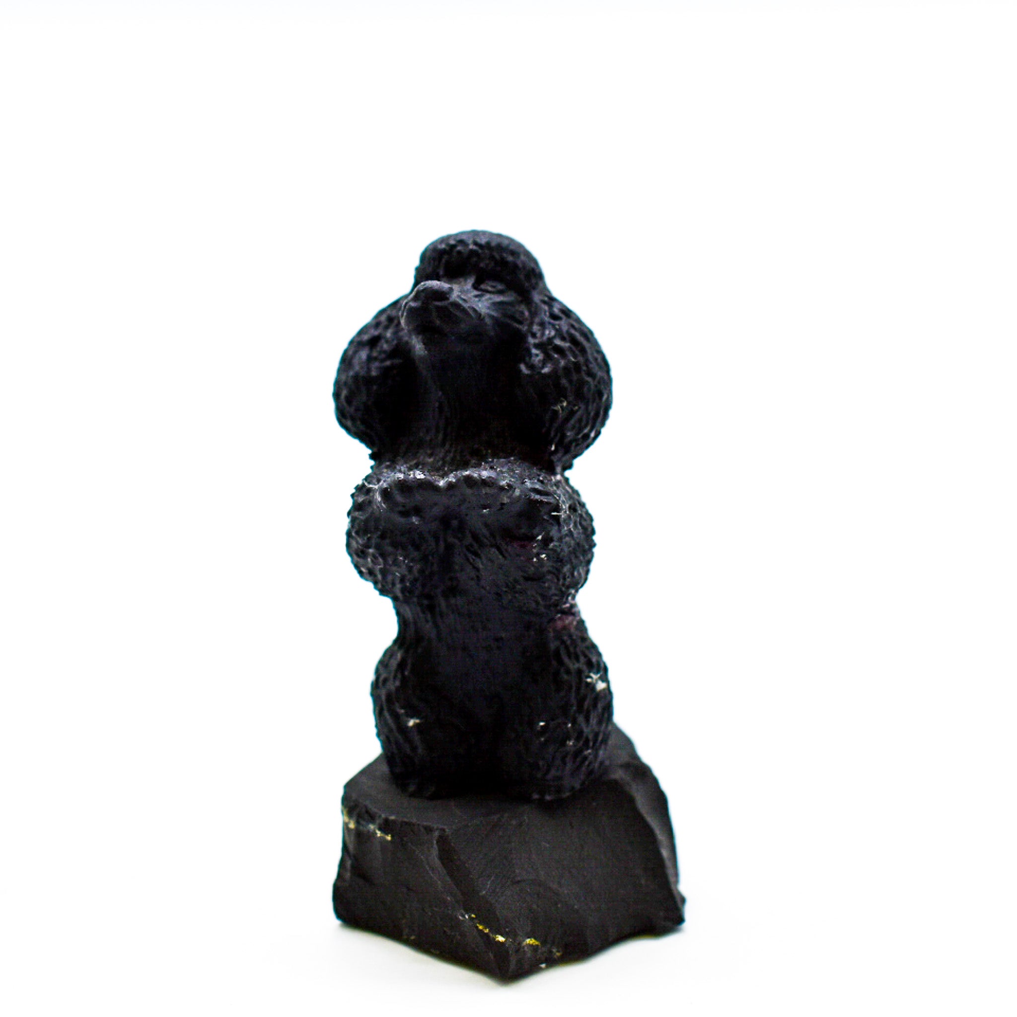 A collection of adorable Shungite Animal Figurines showcasing various animal designs, crafted from black shungite stone.