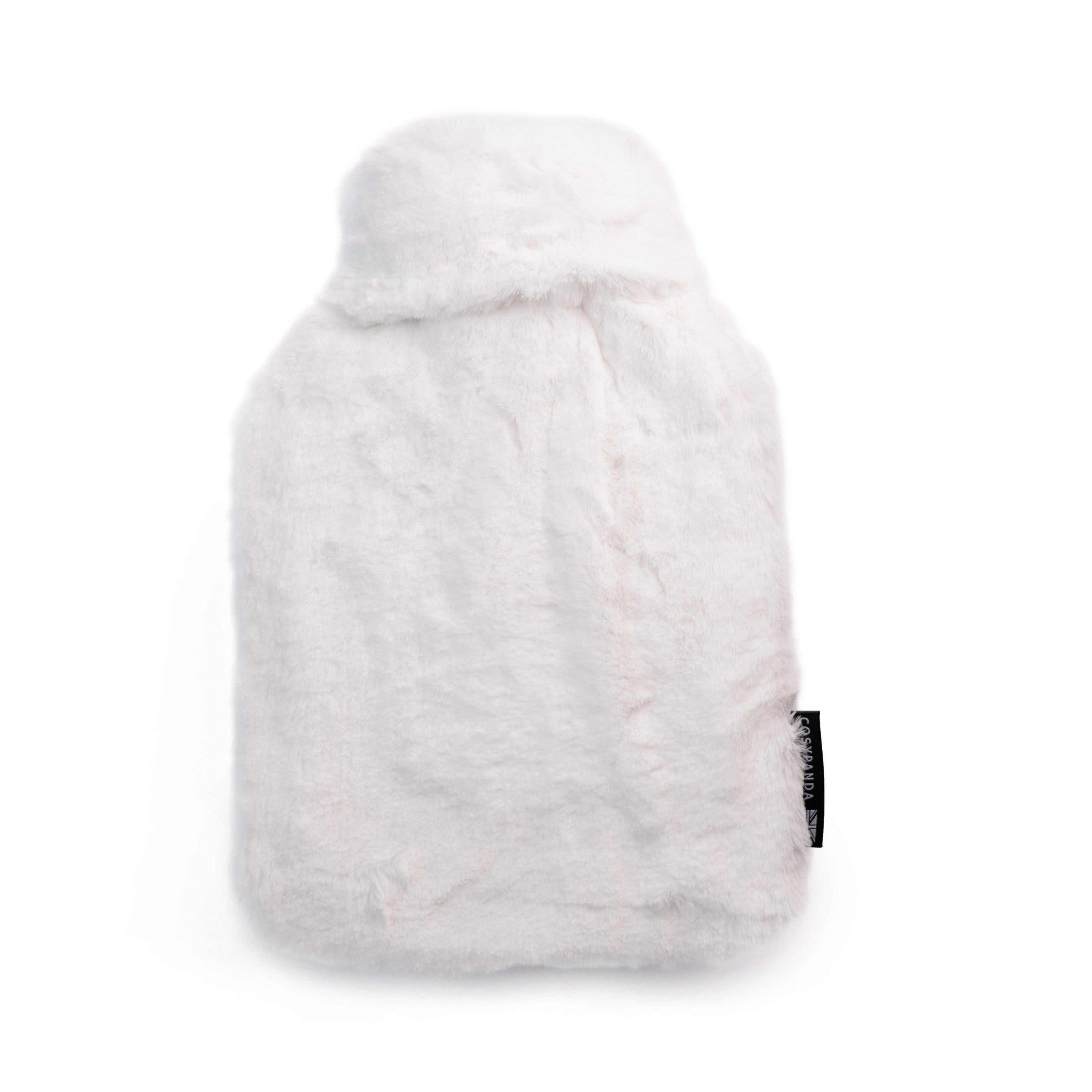 Silky Soft White Hot Water Bottle with luxurious recycled faux fur cover, showcasing its elegant design and eco-friendly materials.