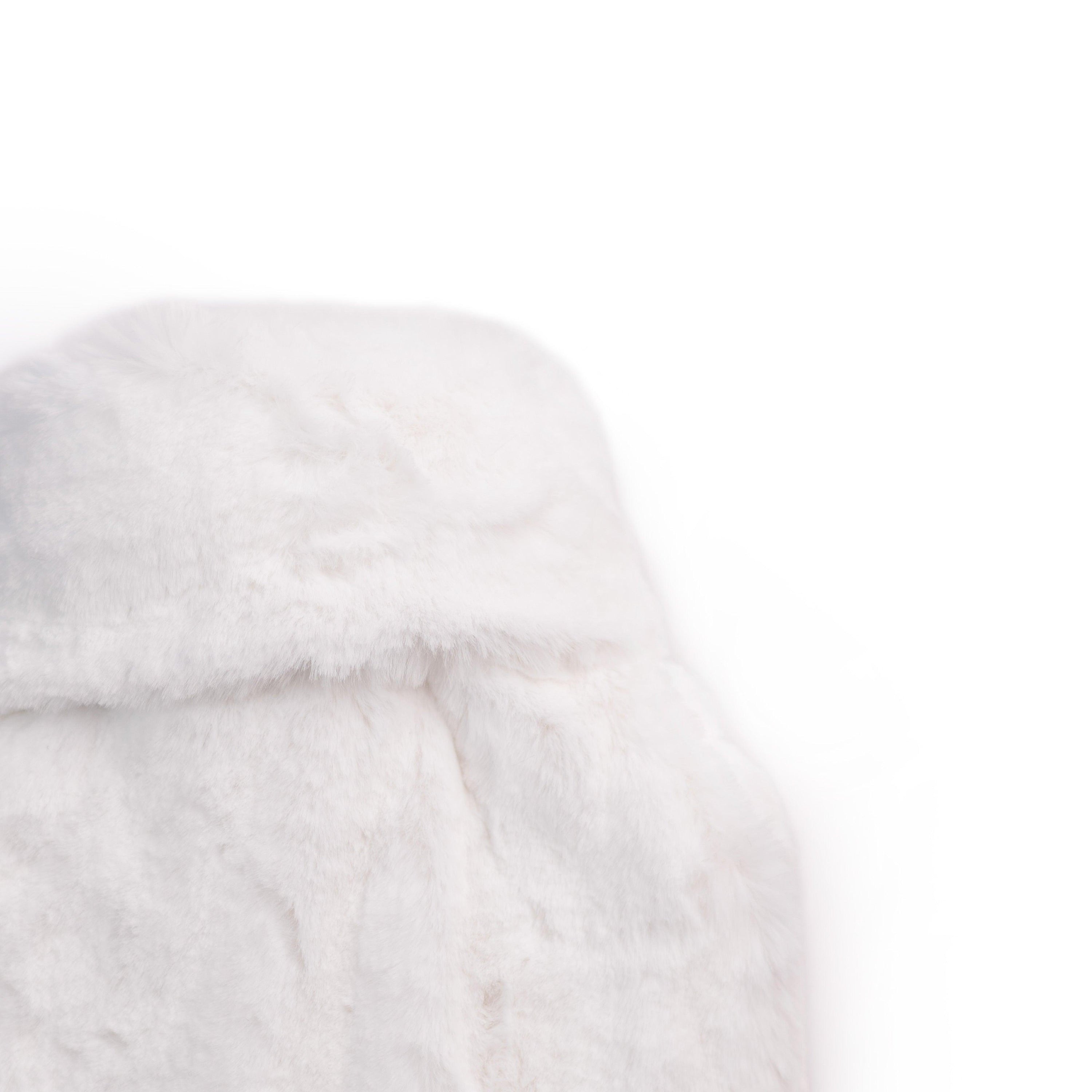 Silky Soft White Hot Water Bottle with luxurious recycled faux fur cover, showcasing its elegant design and eco-friendly materials.