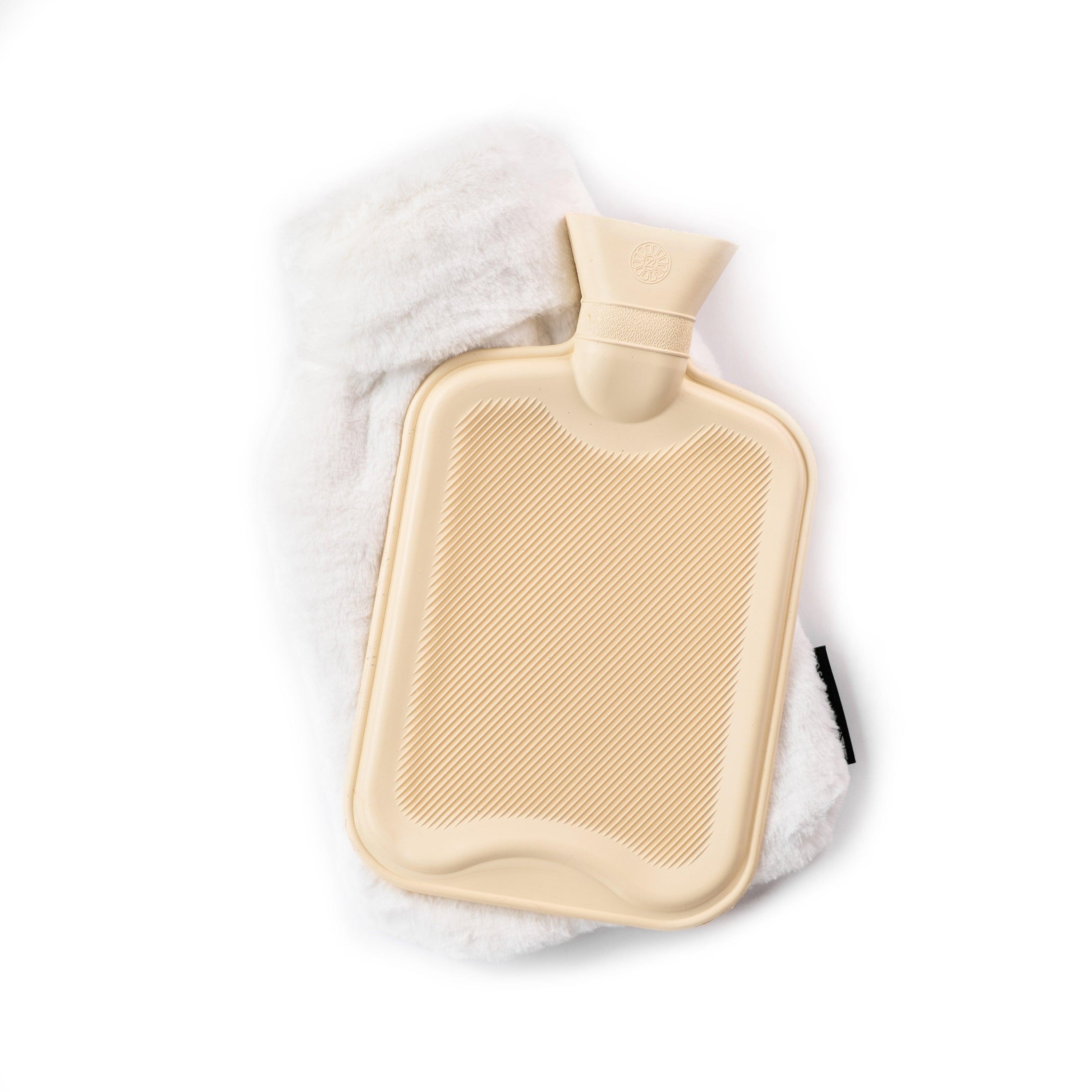 Silky Soft White Hot Water Bottle with luxurious recycled faux fur cover, showcasing its elegant design and eco-friendly materials.