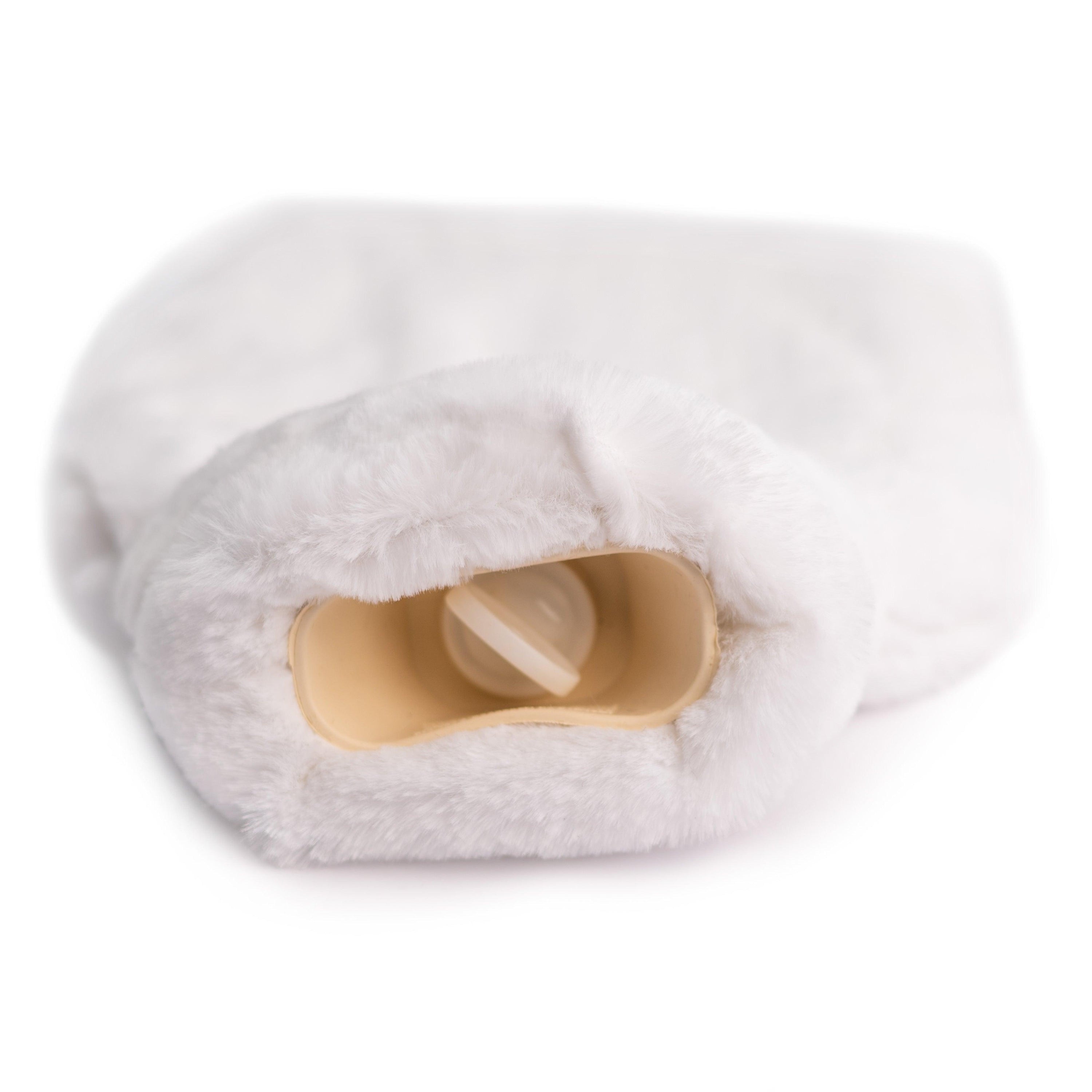 Silky Soft White Hot Water Bottle with luxurious recycled faux fur cover, showcasing its elegant design and eco-friendly materials.