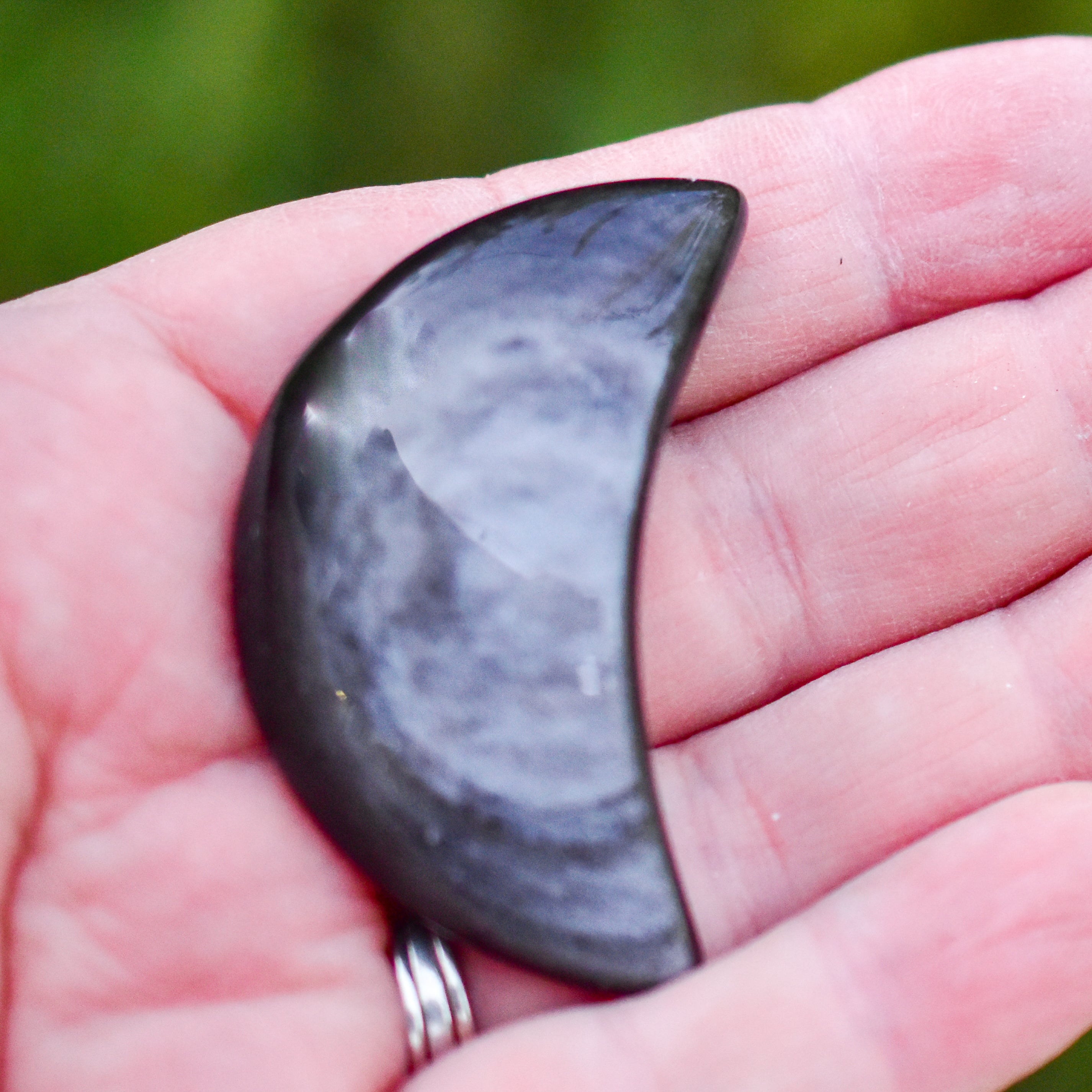 Handcrafted Silver Sheen Obsidian Moons in crescent shapes, showcasing unique silver and gold sheen.