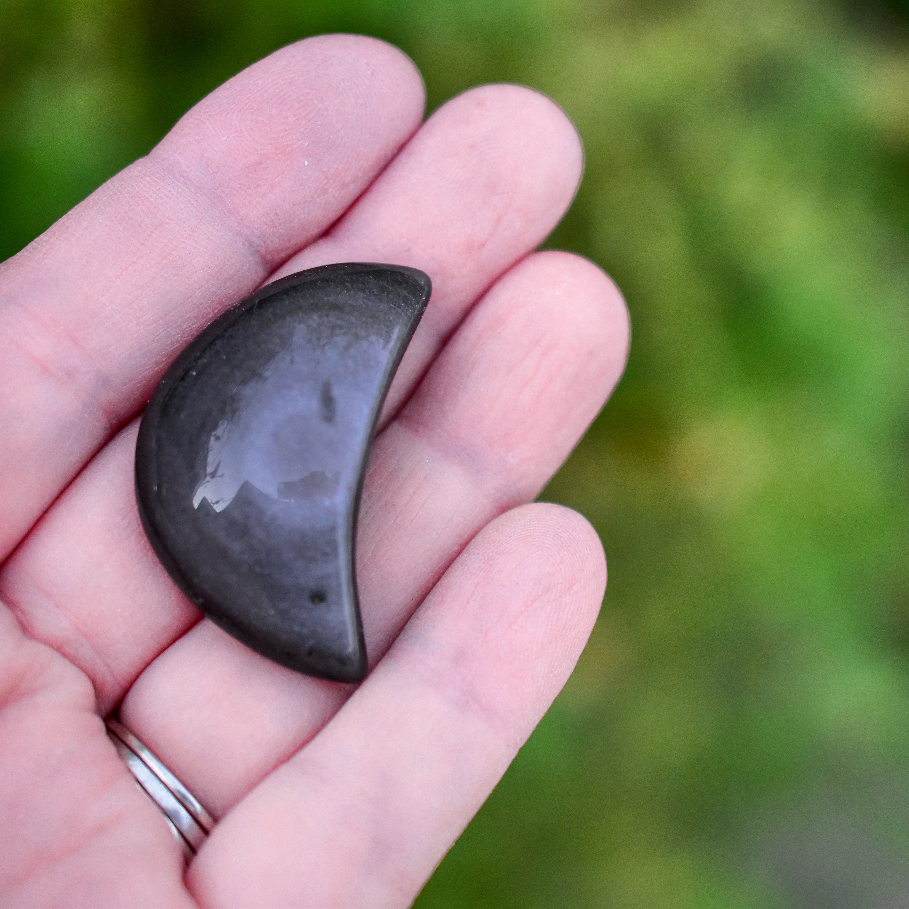 Handcrafted Silver Sheen Obsidian Moons in crescent shapes, showcasing unique silver and gold sheen.