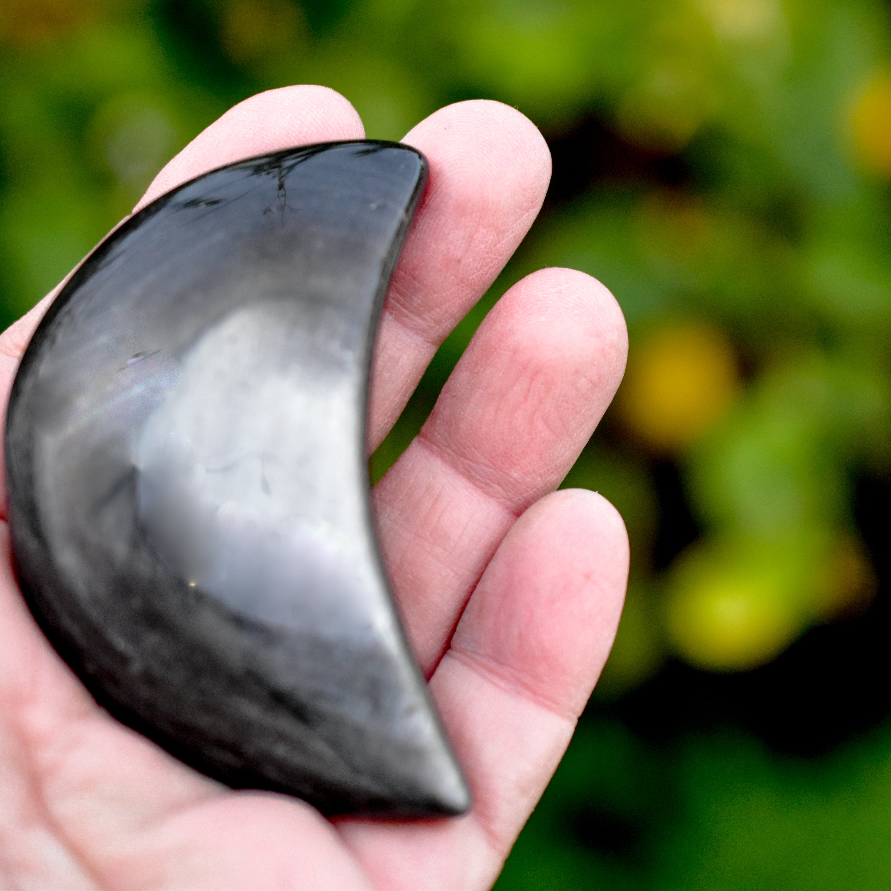 Handcrafted Silver Sheen Obsidian Moons in crescent shapes, showcasing unique silver and gold sheen.