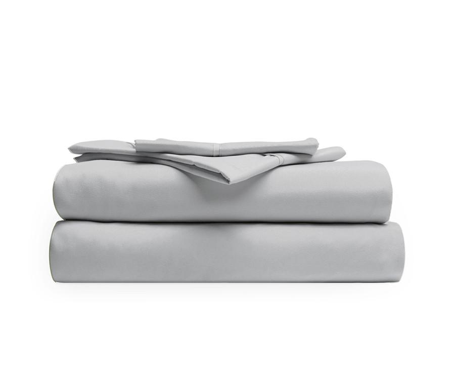 Luxurious silver brushed microfiber sheets set including fitted sheet, flat sheet, and pillowcases, showcasing their soft texture and elegant color.