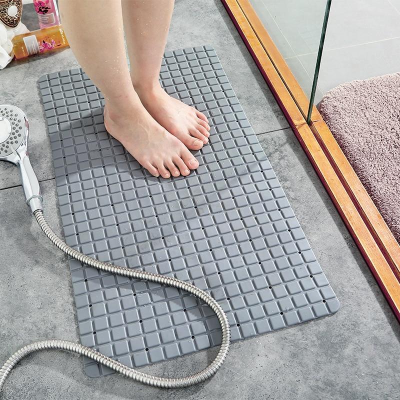 A large, eco-friendly PVC bath mat with a modern plaid pattern, featuring a non-slip surface for safety in the bathroom.