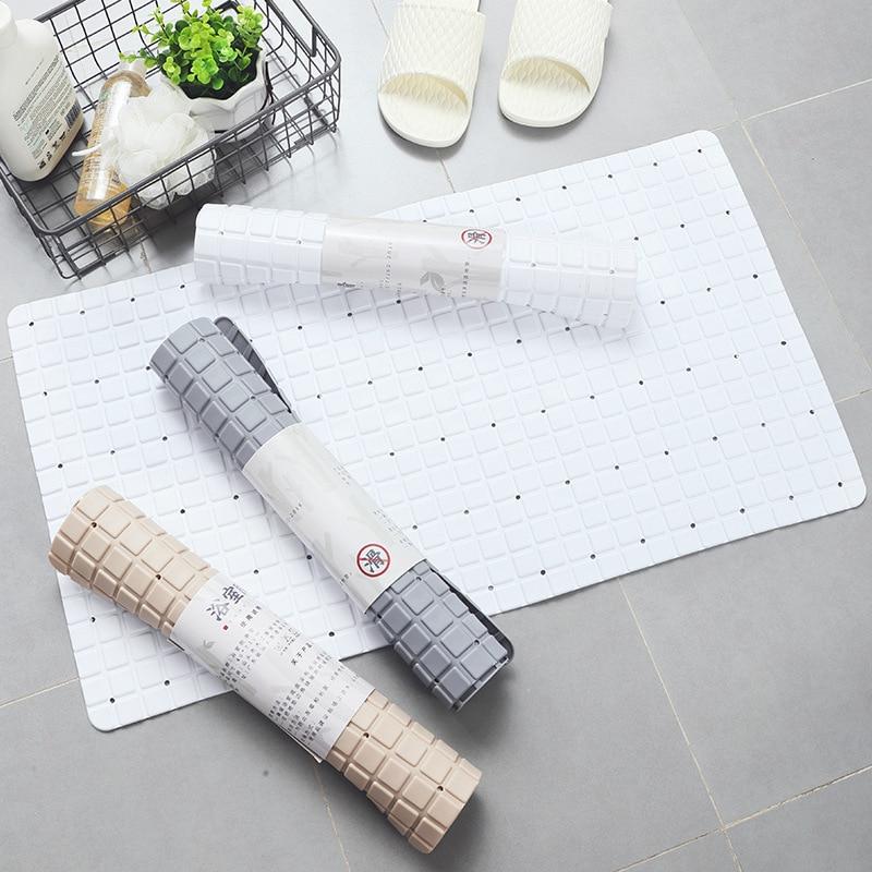 A large, eco-friendly PVC bath mat with a modern plaid pattern, featuring a non-slip surface for safety in the bathroom.