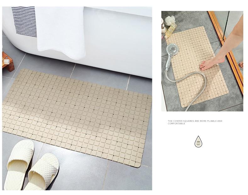 A large, eco-friendly PVC bath mat with a modern plaid pattern, featuring a non-slip surface for safety in the bathroom.