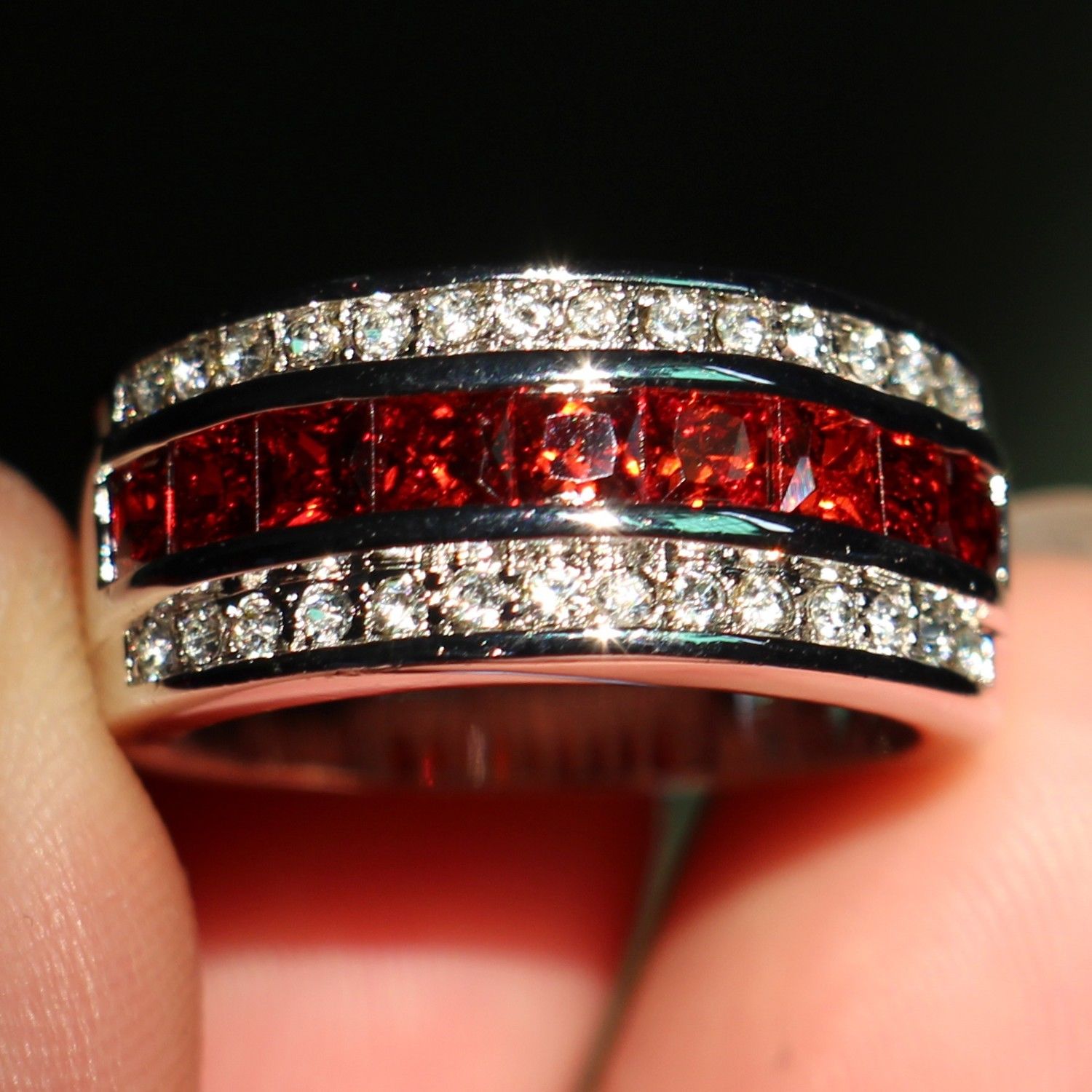 Men's antique jewelry ring featuring a red garnet stone set in a 10kt white gold filled band, available in sizes 8-12.