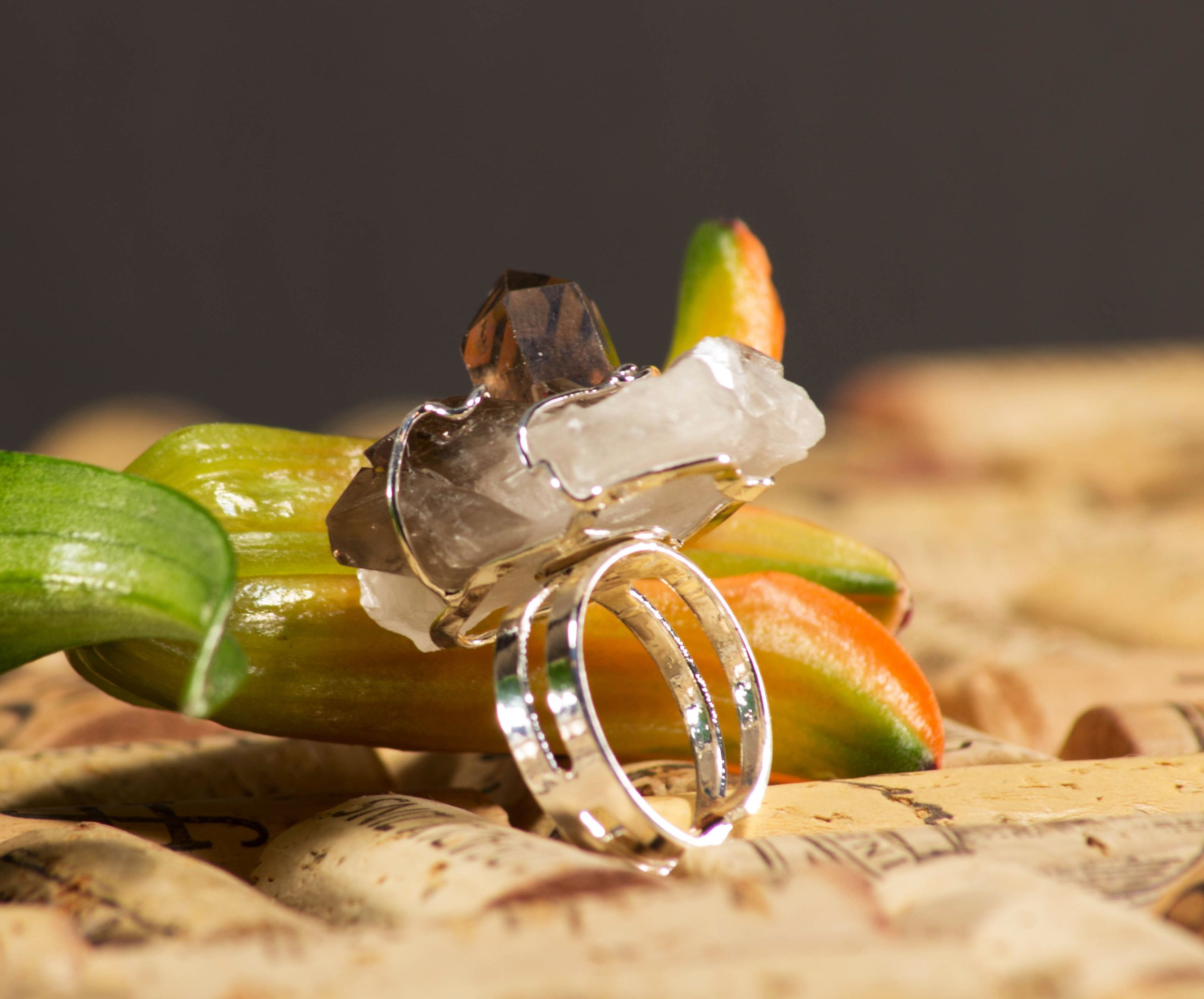 A stunning smoky quartz ring wrapped in gold or silver wire, showcasing its unique gemstone and elegant design.