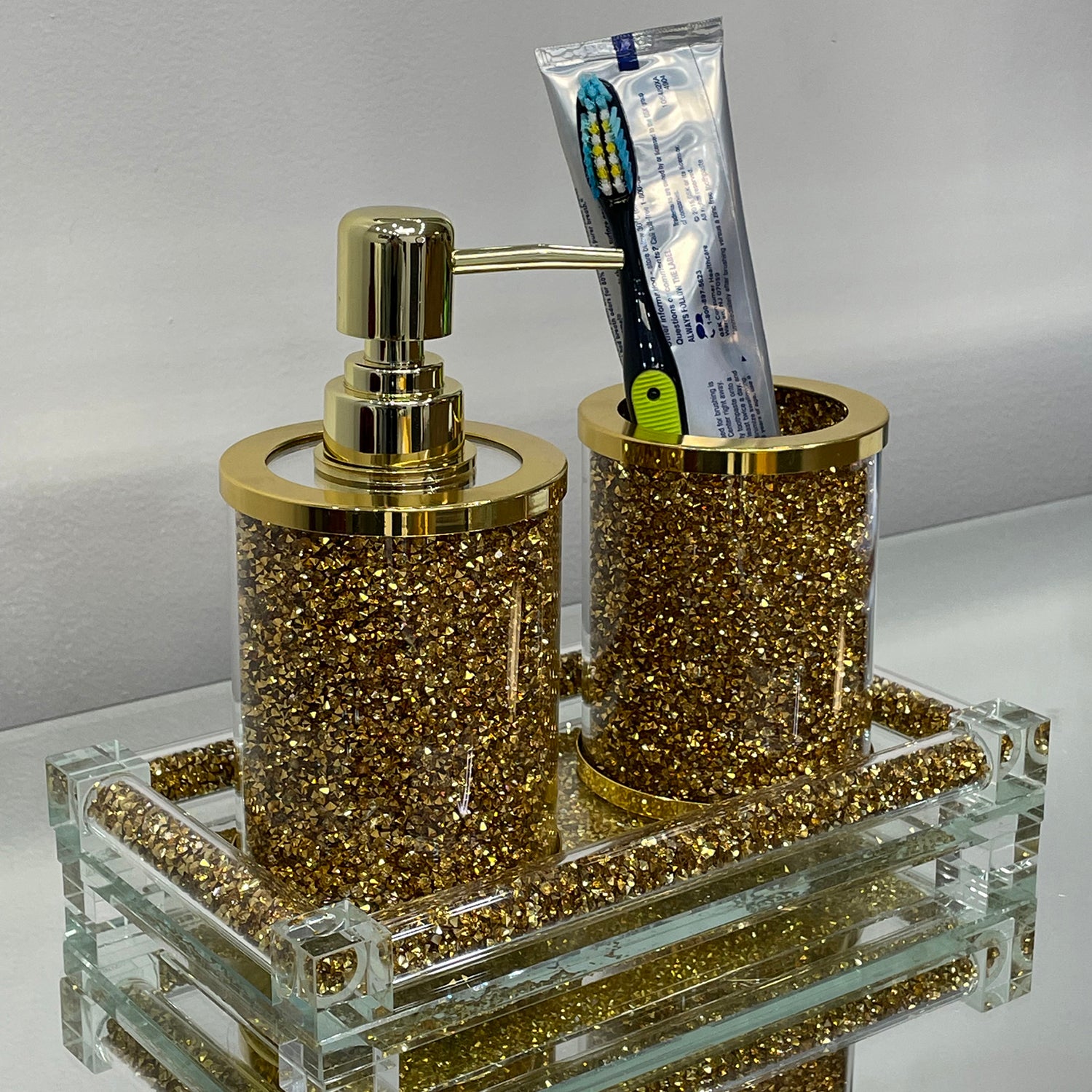 Elegant gold crushed diamond soap dispenser and toothbrush holder set with tray, beautifully packaged in a gift box.