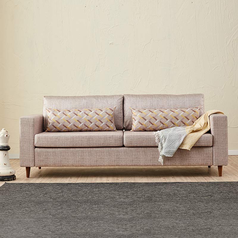 RIO Cream three-seater sofa featuring elegant design, durable fabric, and walnut wooden legs.