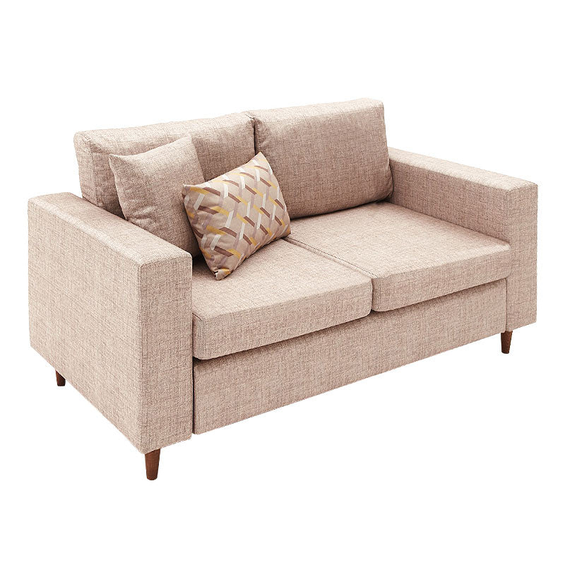 AUGUSTA Cream two-seater sofa featuring elegant fabric upholstery and walnut wooden legs.