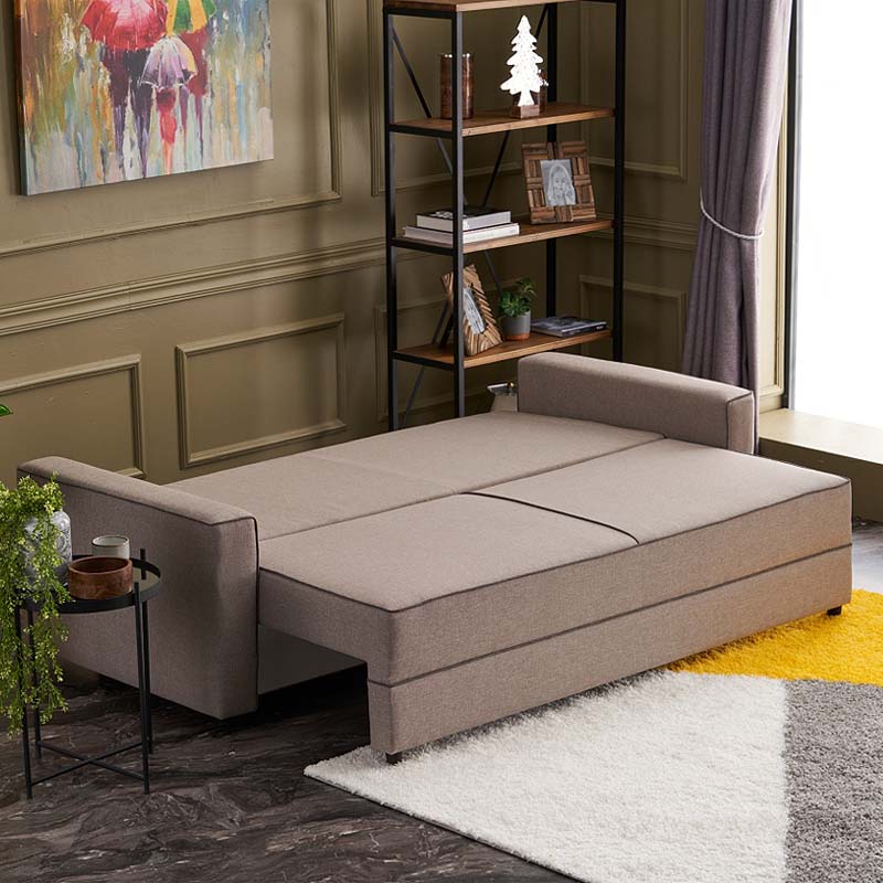 LANA three-seater sofa bed in cream color, showcasing its elegant design and spacious seating.