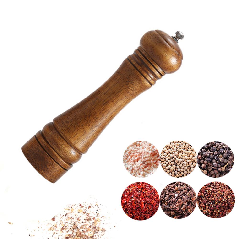 Solid Oak Spice Grinder in three sizes, showcasing its elegant design and durable materials.