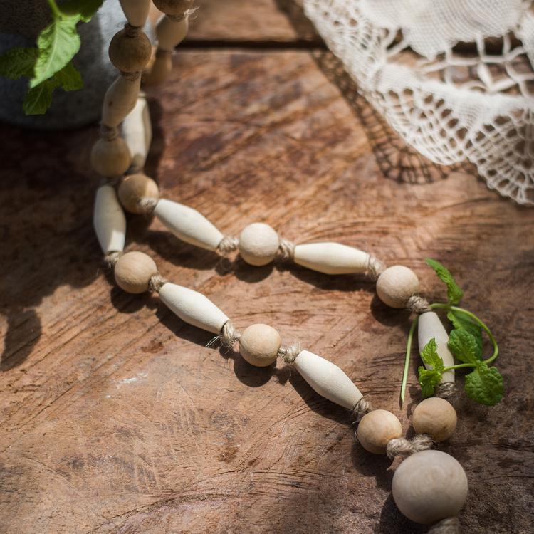 Solid wood handmade rustic curtain tiebacks in beige and khaki colors, showcasing their elegant design and craftsmanship.