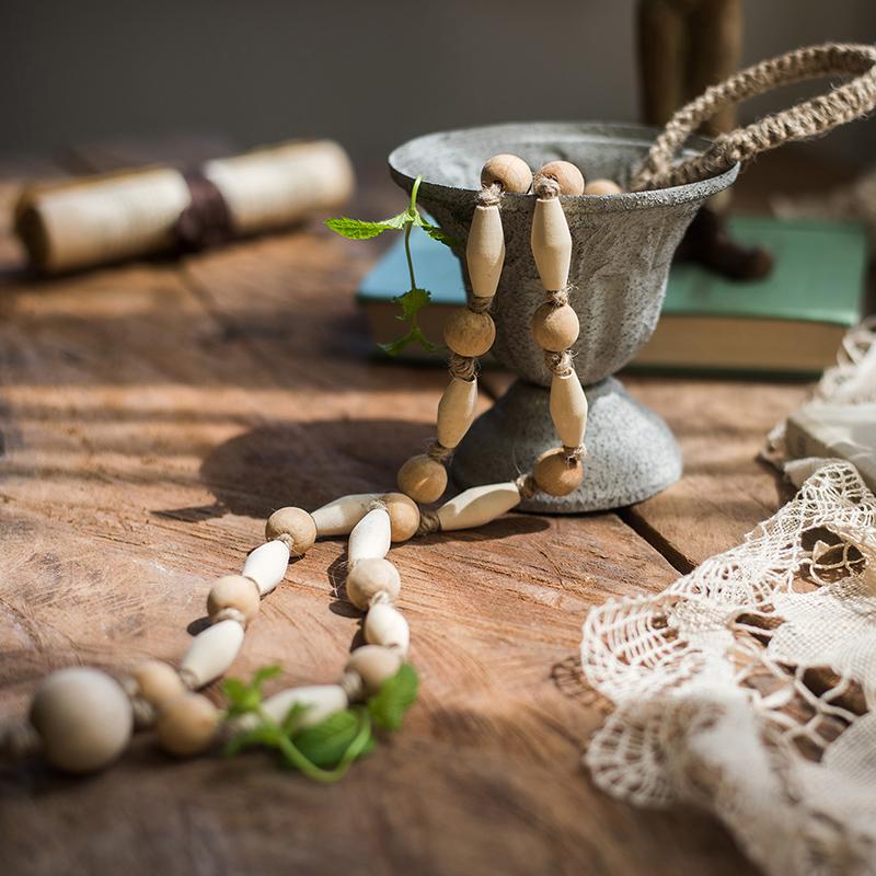 Solid wood handmade rustic curtain tiebacks in beige and khaki colors, showcasing their elegant design and craftsmanship.