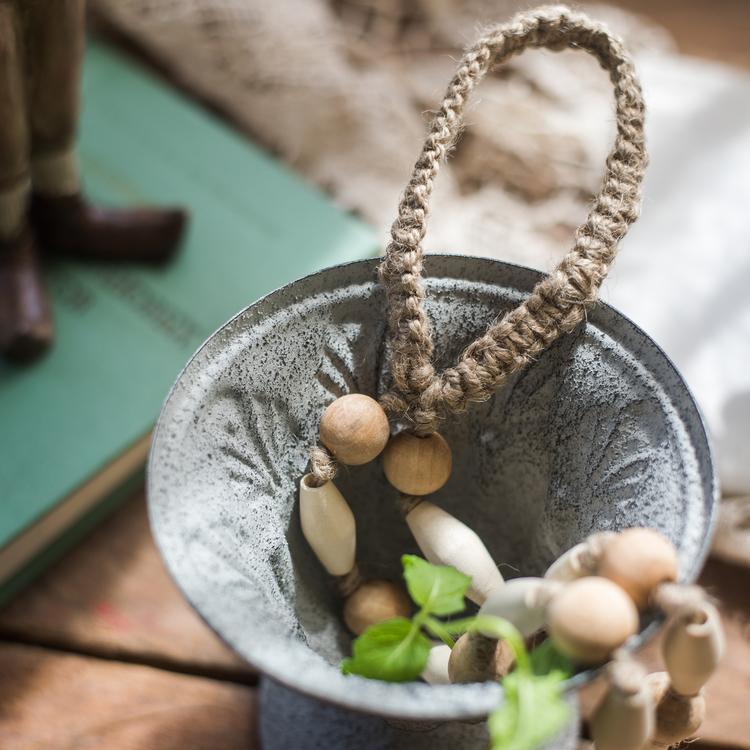 Solid wood handmade rustic curtain tiebacks in beige and khaki colors, showcasing their elegant design and craftsmanship.