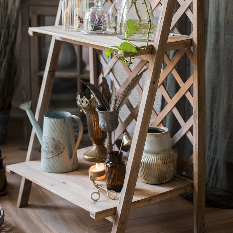 Solid Wood Two Tier Plant Stand Book Shelf in light brown, showcasing plants and books elegantly on two levels.