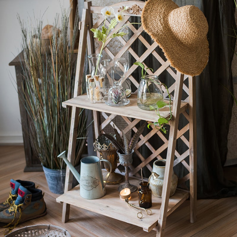 Solid Wood Two Tier Plant Stand Book Shelf in light brown, showcasing plants and books elegantly on two levels.