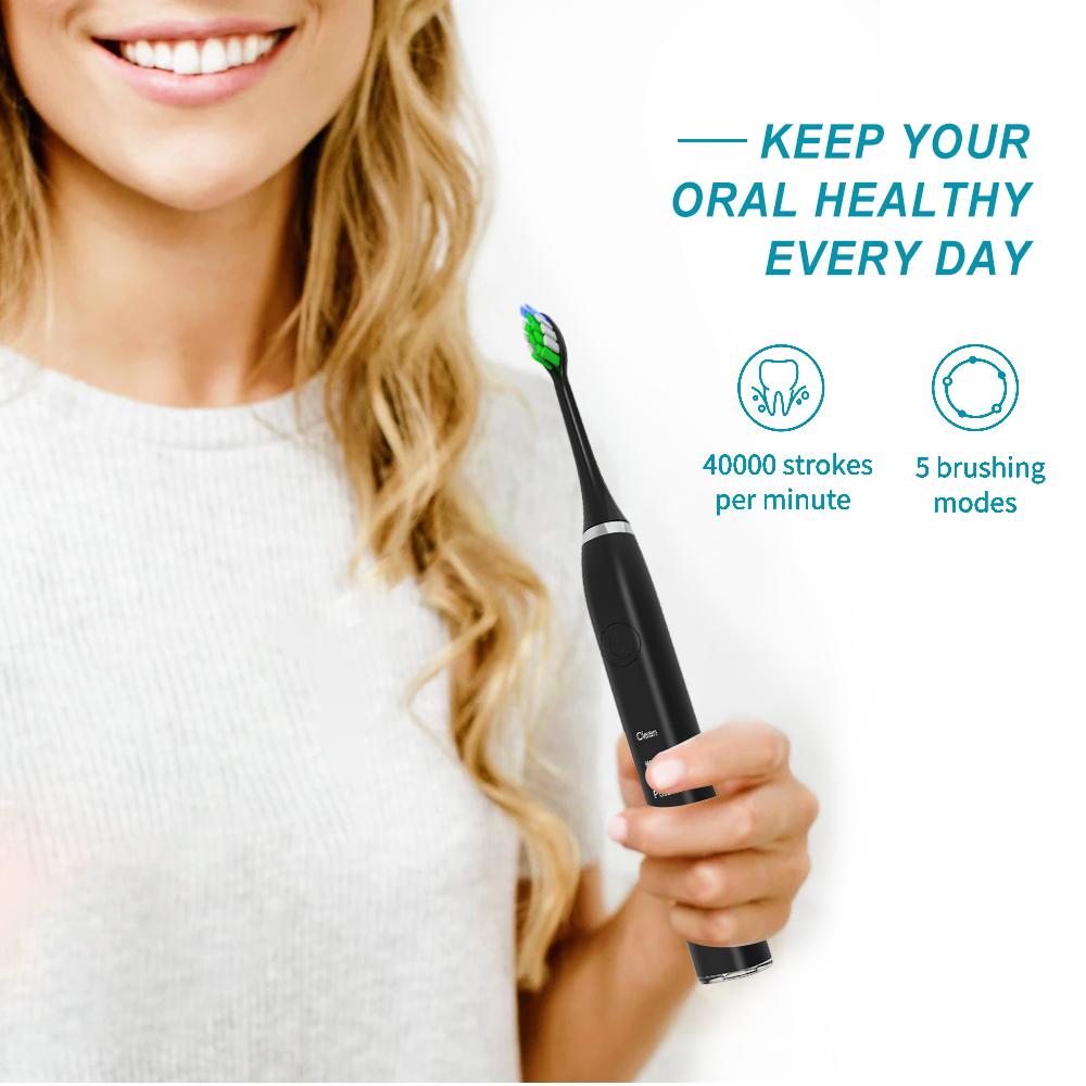 Sonic Electric Toothbrush in black and white with charging base, showcasing its sleek design and waterproof features.