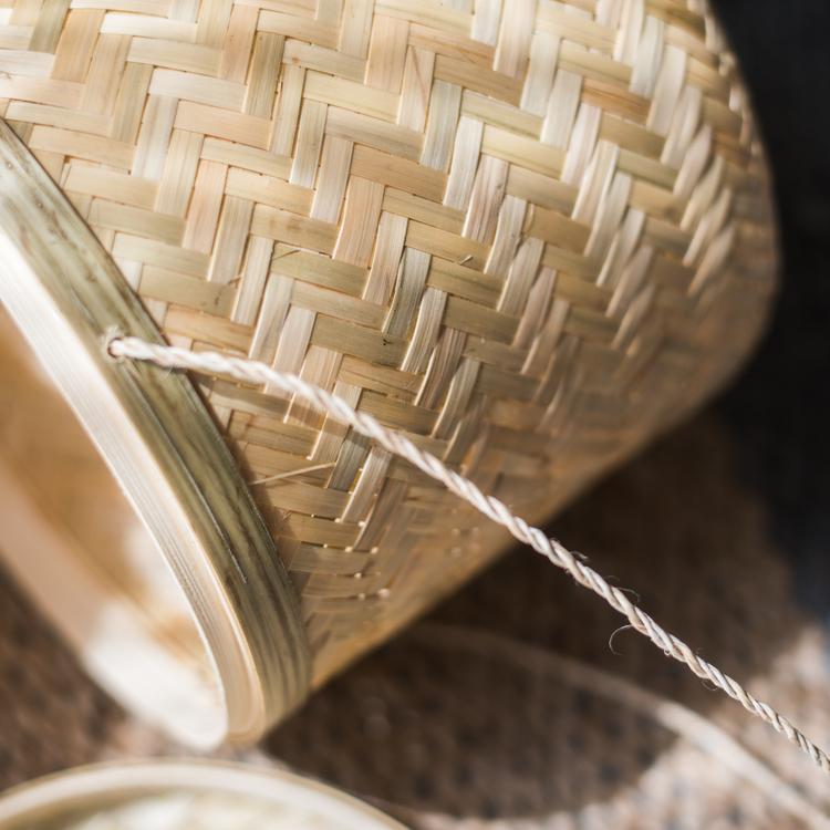 Southeast Asia Round Bamboo Tea Box Jar in natural bamboo color, showcasing its elegant round design and two size options.