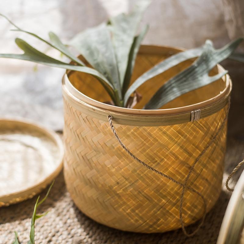 Southeast Asia Round Bamboo Tea Box Jar in natural bamboo color, showcasing its elegant round design and two size options.