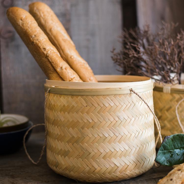 Southeast Asia Round Bamboo Tea Box Jar in natural bamboo color, showcasing its elegant round design and two size options.