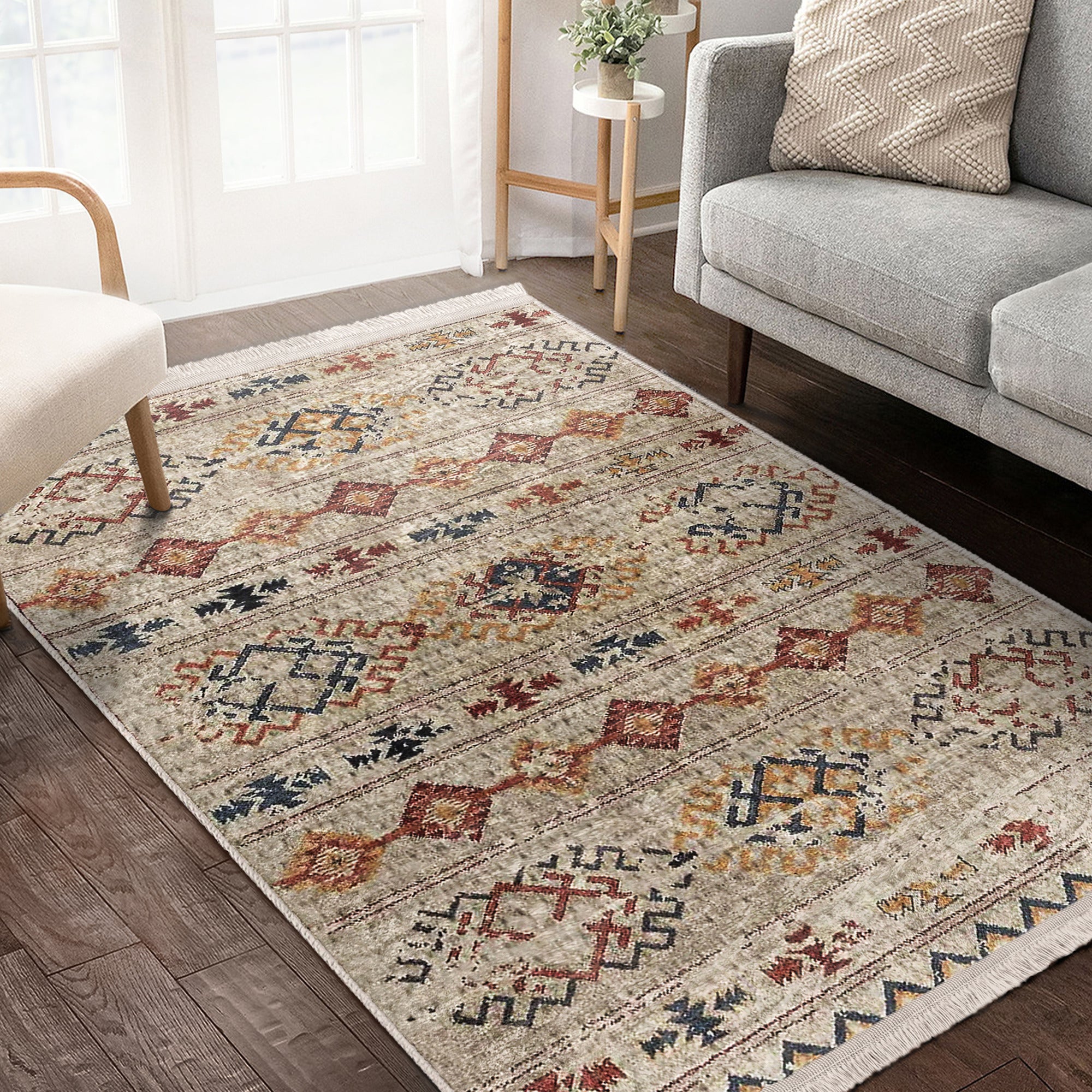 Southwestern style washable area rug with vibrant colors and fringes, featuring a non-slip woven base for safety.