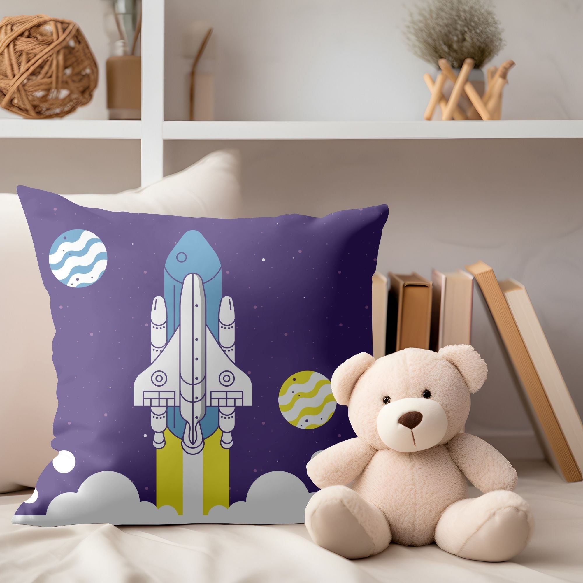 A colorful kids pillow featuring a vibrant space rocket design, perfect for children's rooms and outdoor use.