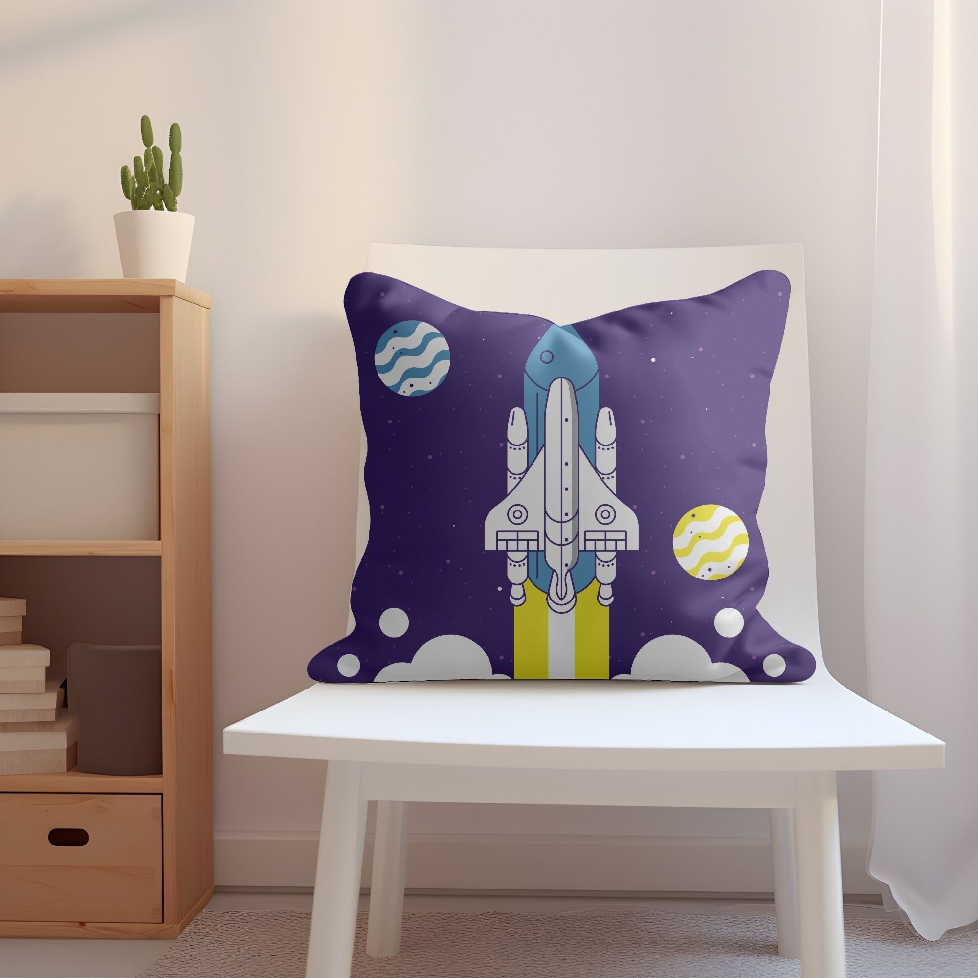 A colorful kids pillow featuring a vibrant space rocket design, perfect for children's rooms and outdoor use.