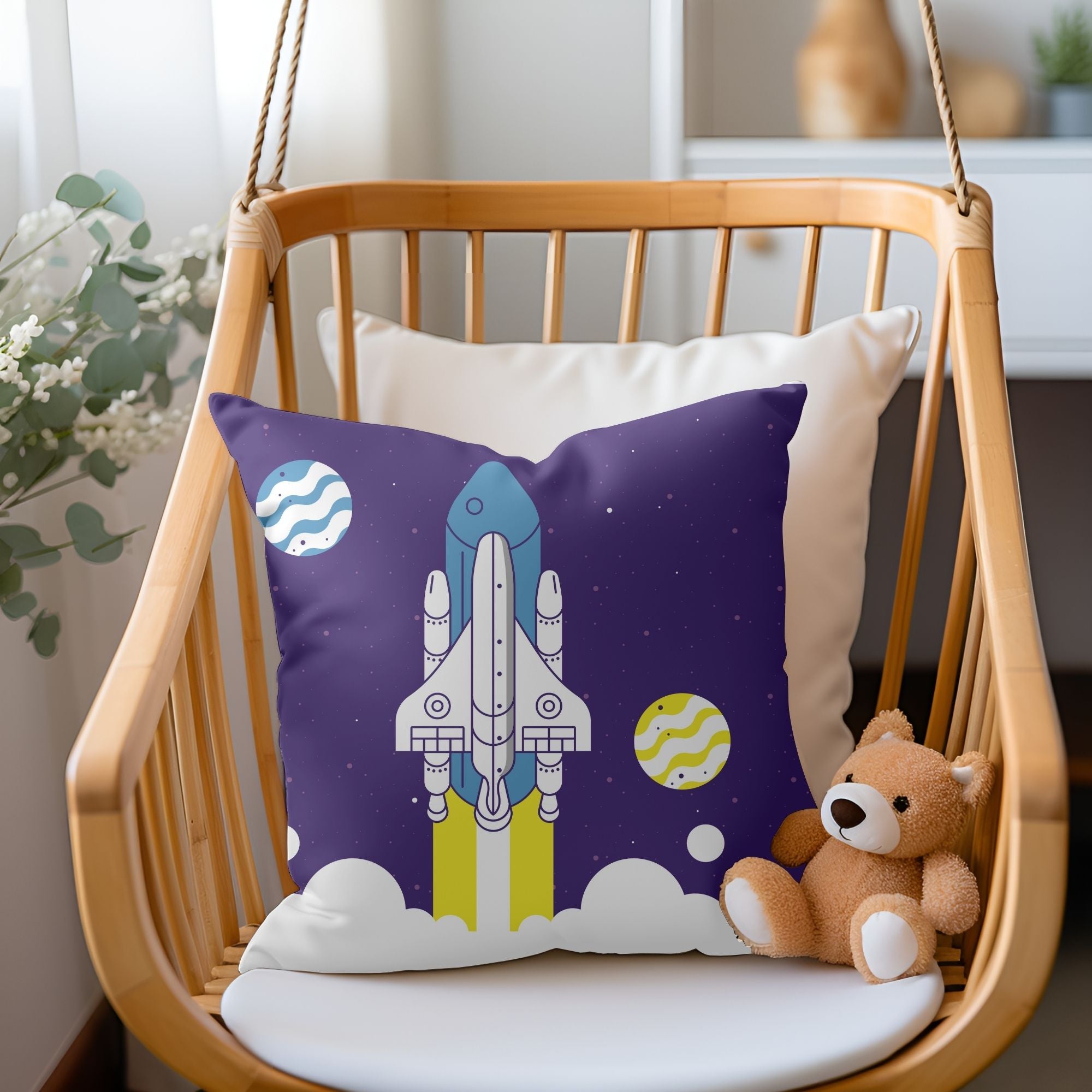 A colorful kids pillow featuring a vibrant space rocket design, perfect for children's rooms and outdoor use.