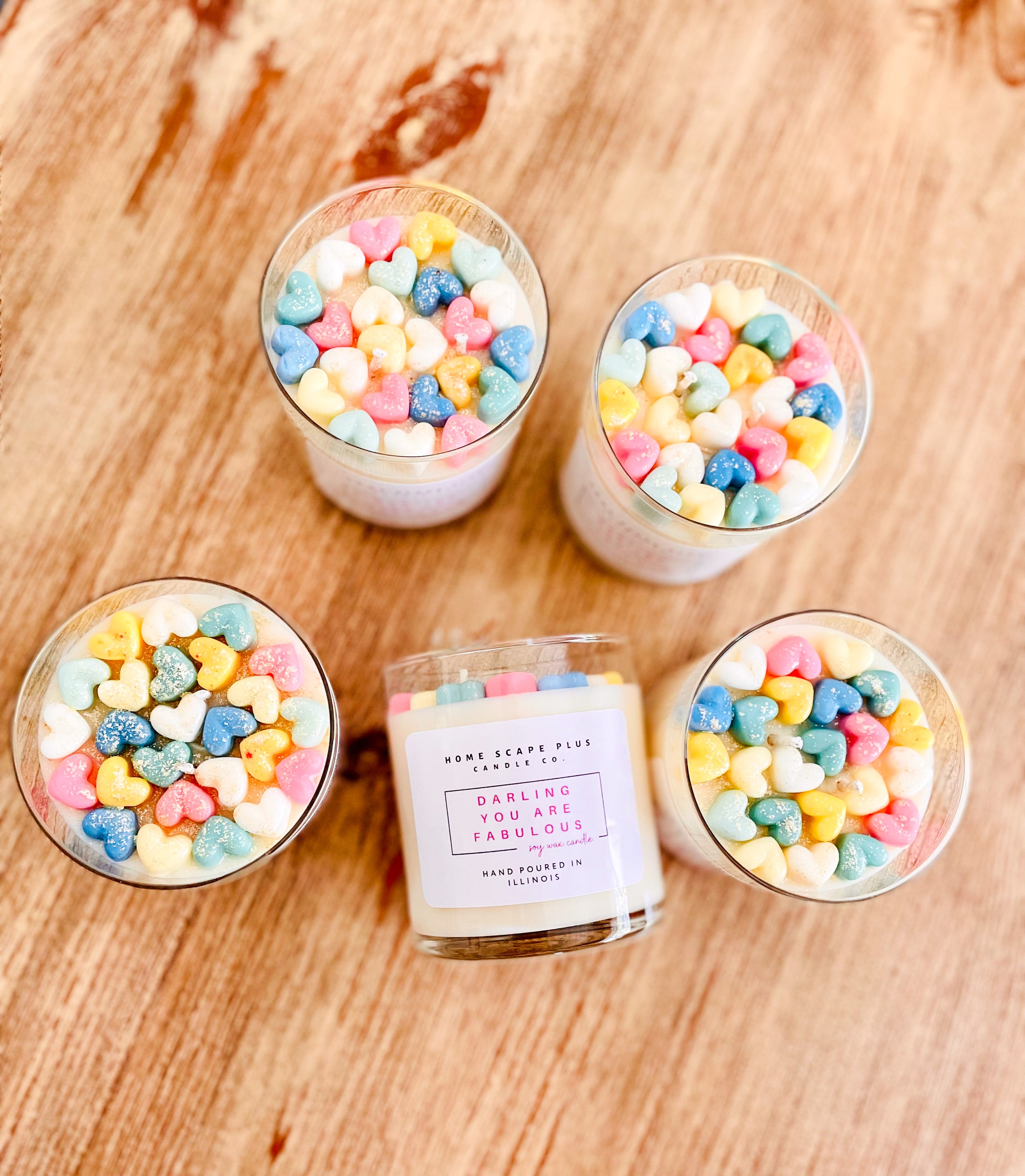 Sparkling Rainbow Soy Candle with vibrant pastille colors and a sweet vanilla scent, elegantly displayed.