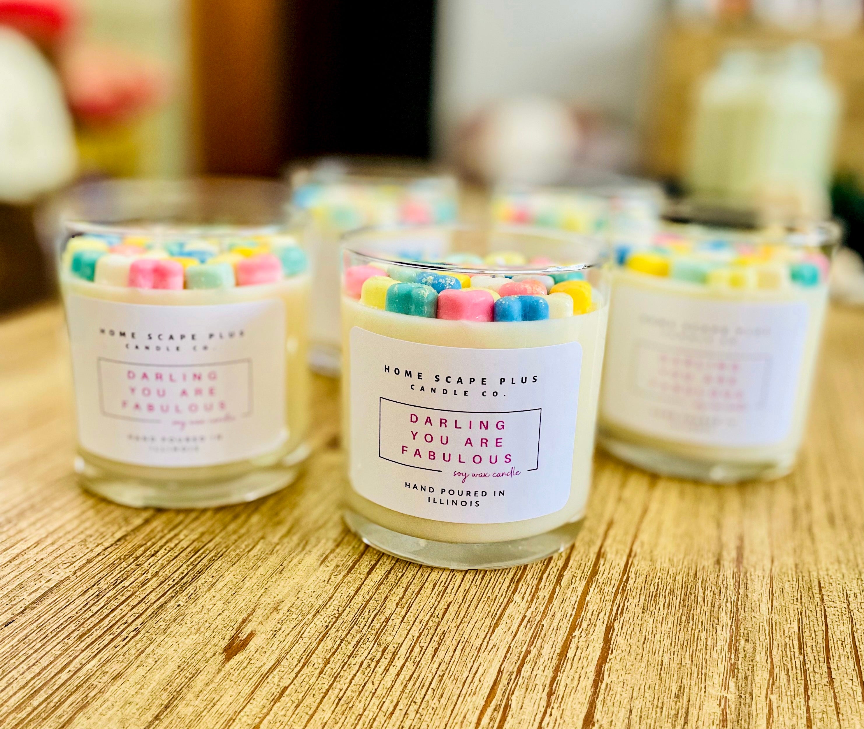 Sparkling Rainbow Soy Candle with vibrant pastille colors and a sweet vanilla scent, elegantly displayed.