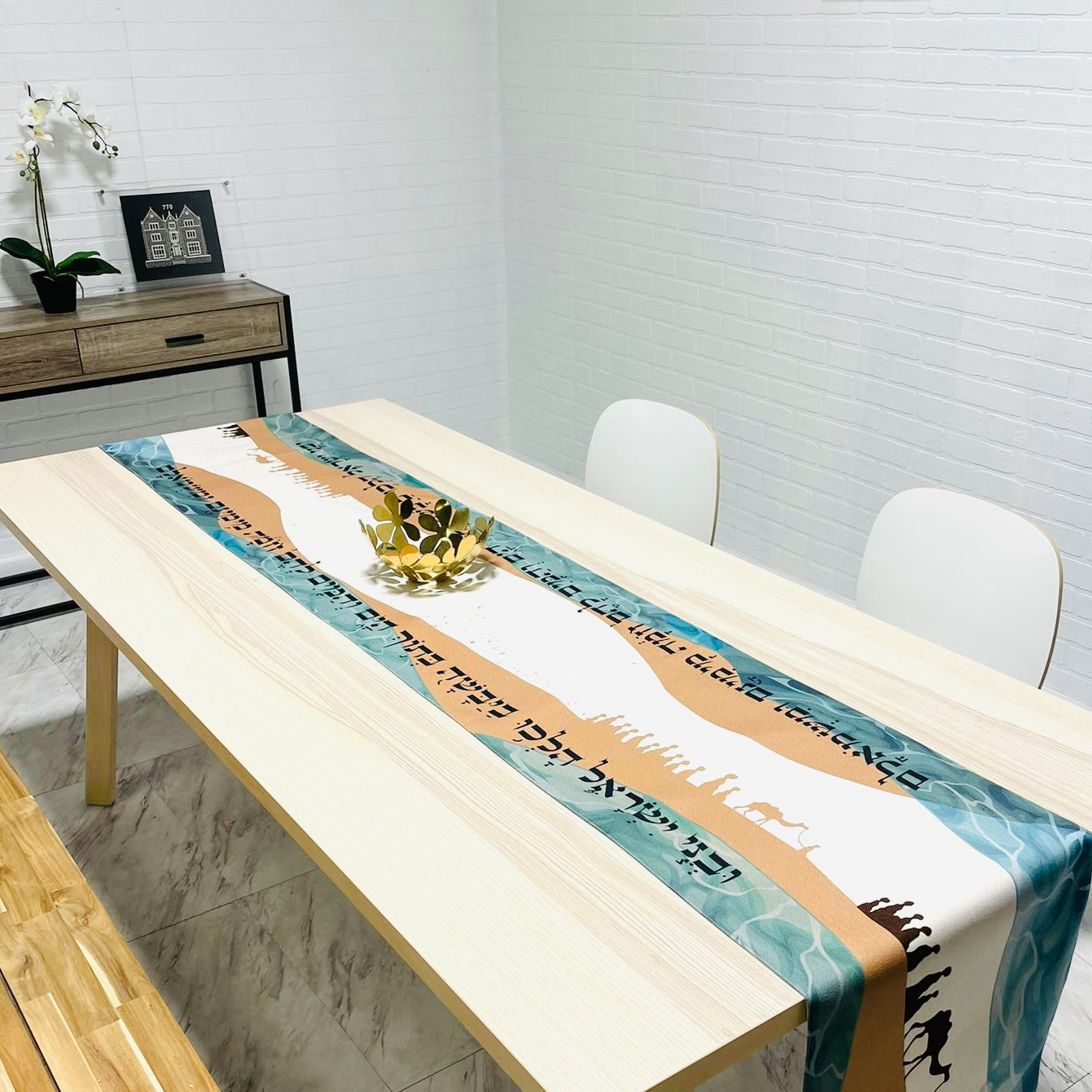 Elegant Split the Sea Passover Table Runner featuring Hebrew writing and beautiful icons, made from cotton linen blend and soft satin.