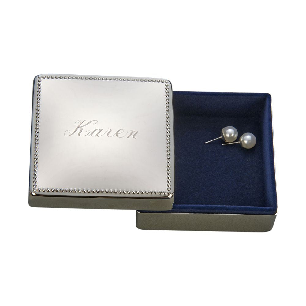 Square box with beaded border, nickel plated, shiny silver finish, dark blue flocked interior, elegant design.