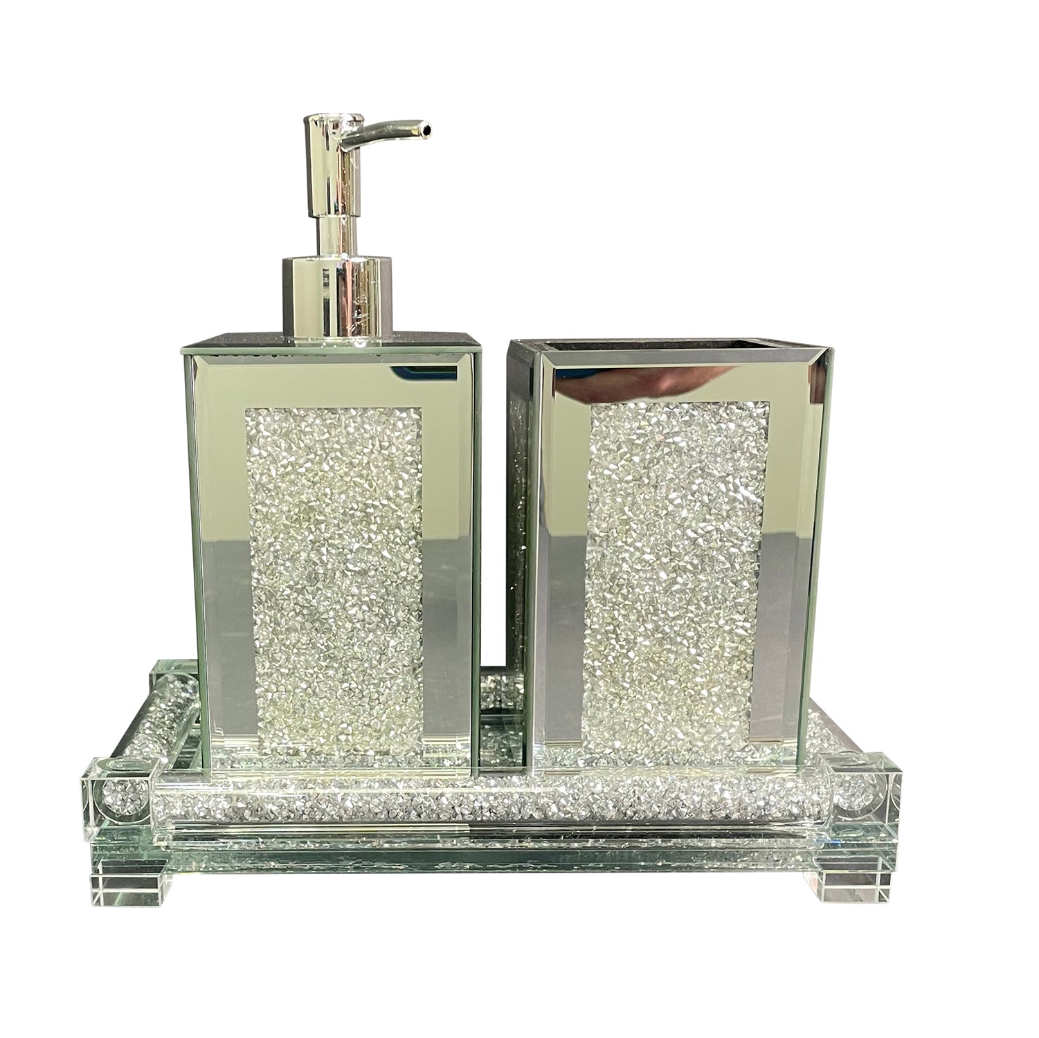 Square soap dispenser and toothbrush holder set in silver crushed diamond design, featuring chrome accents and an elegant tray.