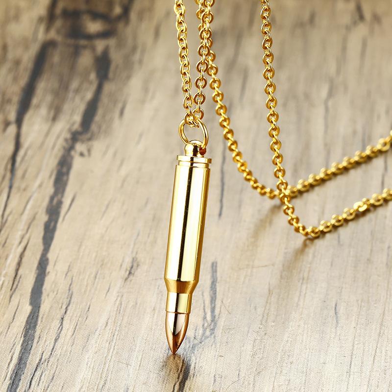 Stylish gold stainless steel bullet pendant necklace for men, designed to hold urn ash, featuring a bohemian charm.