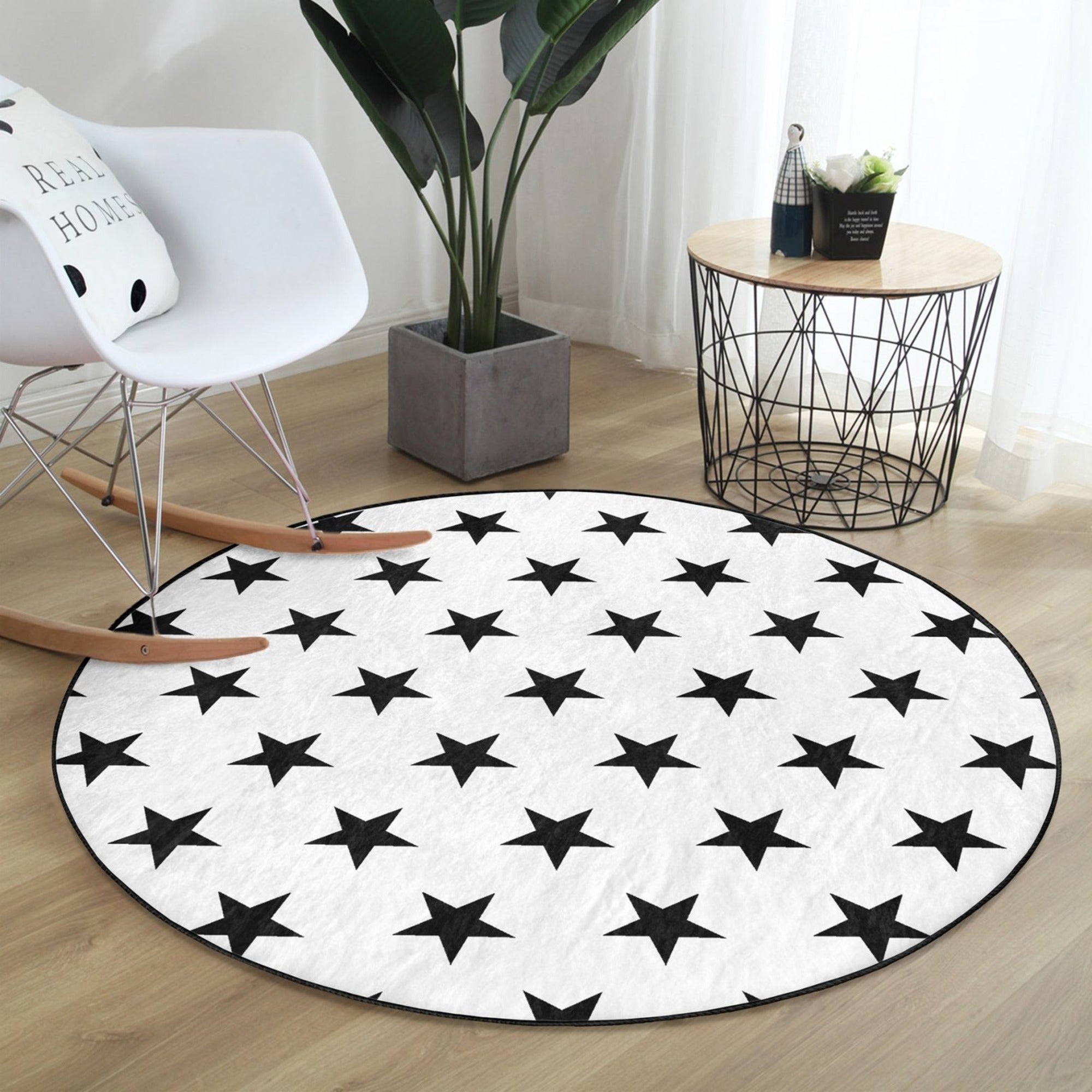 Star Printed Decorative Round Rug featuring a white background with black stars, perfect for living room decor.