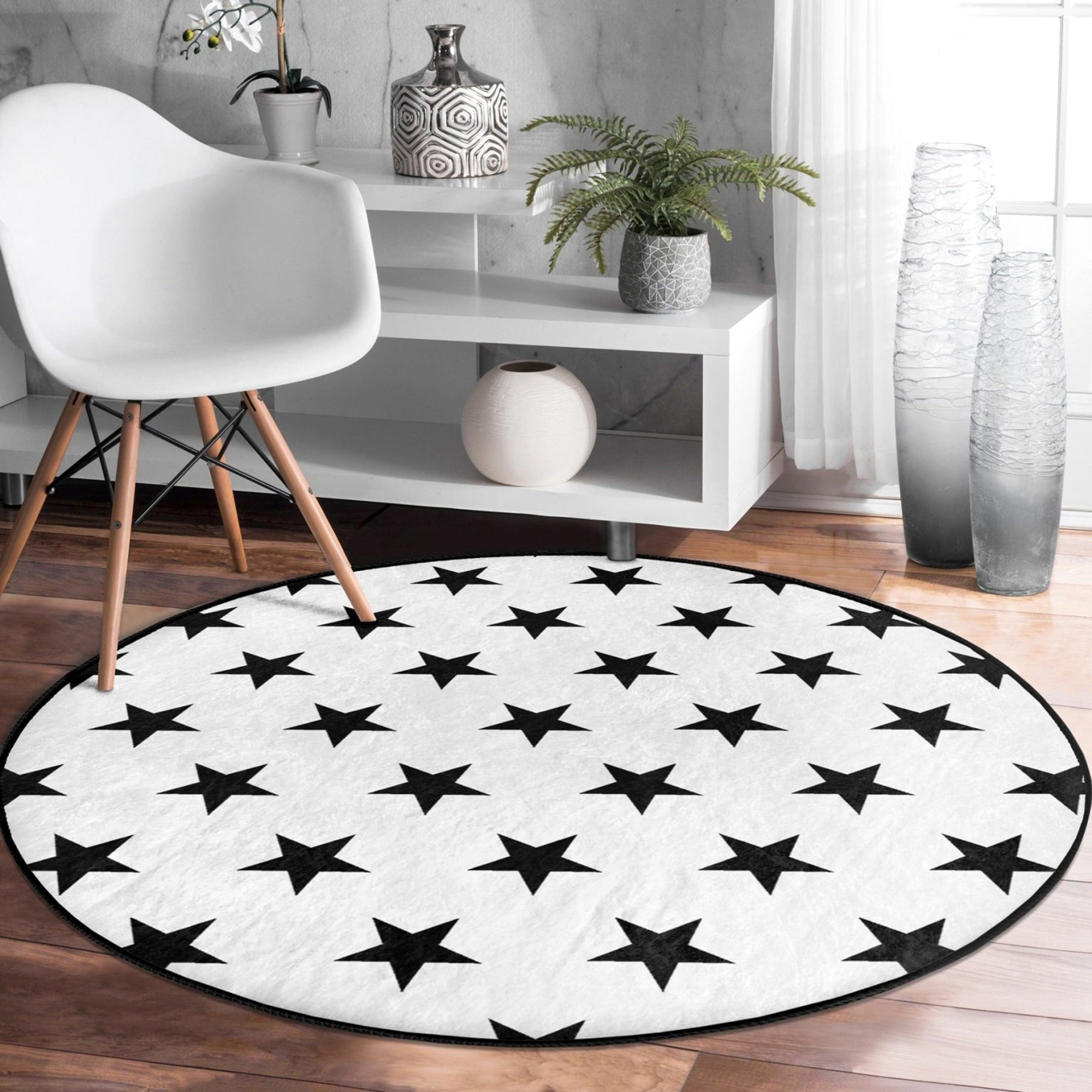 Star Printed Decorative Round Rug featuring a white background with black stars, perfect for living room decor.